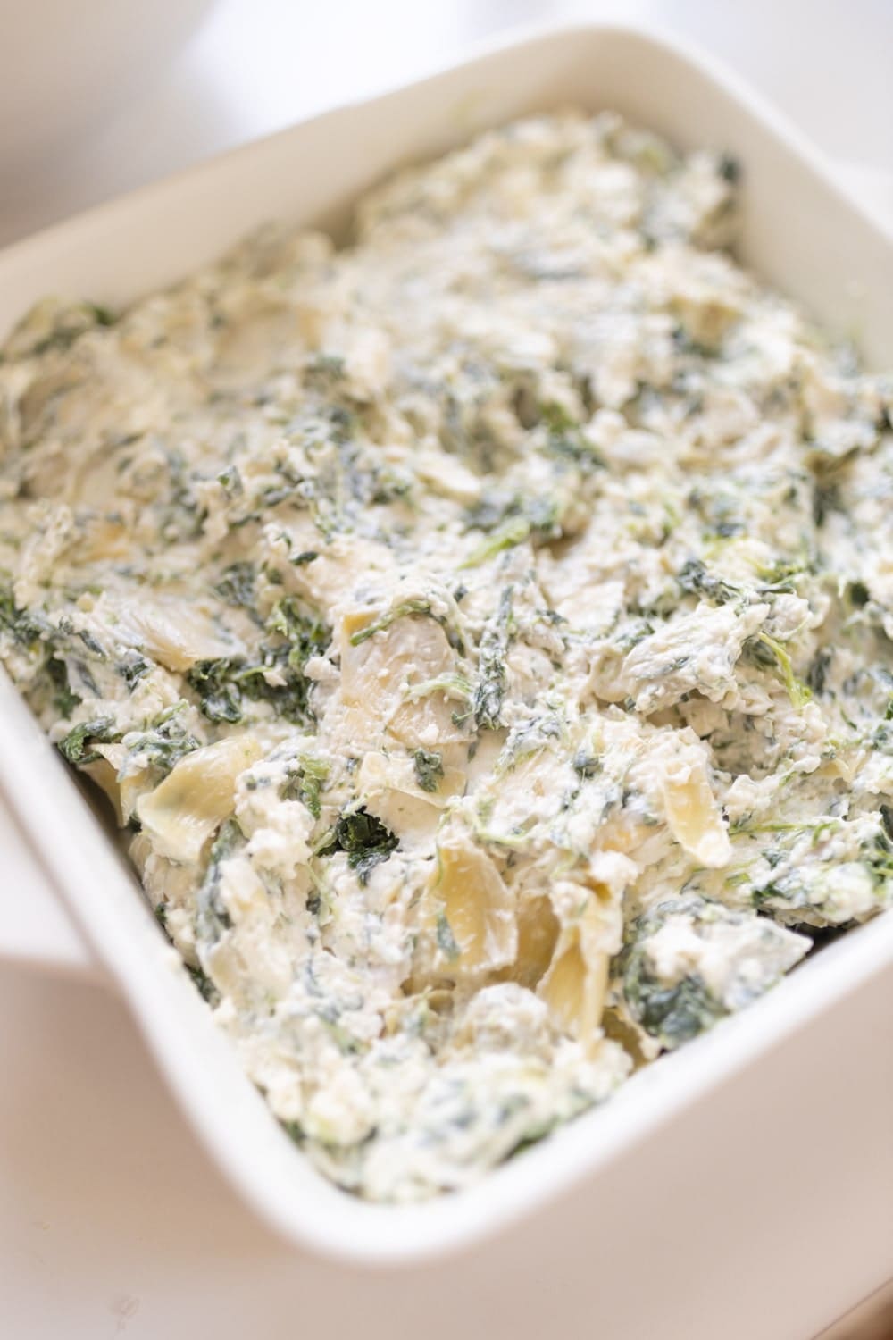 Blogger Stephanie Ziajka shows how to make baked artichoke dip on Diary of a Debutante