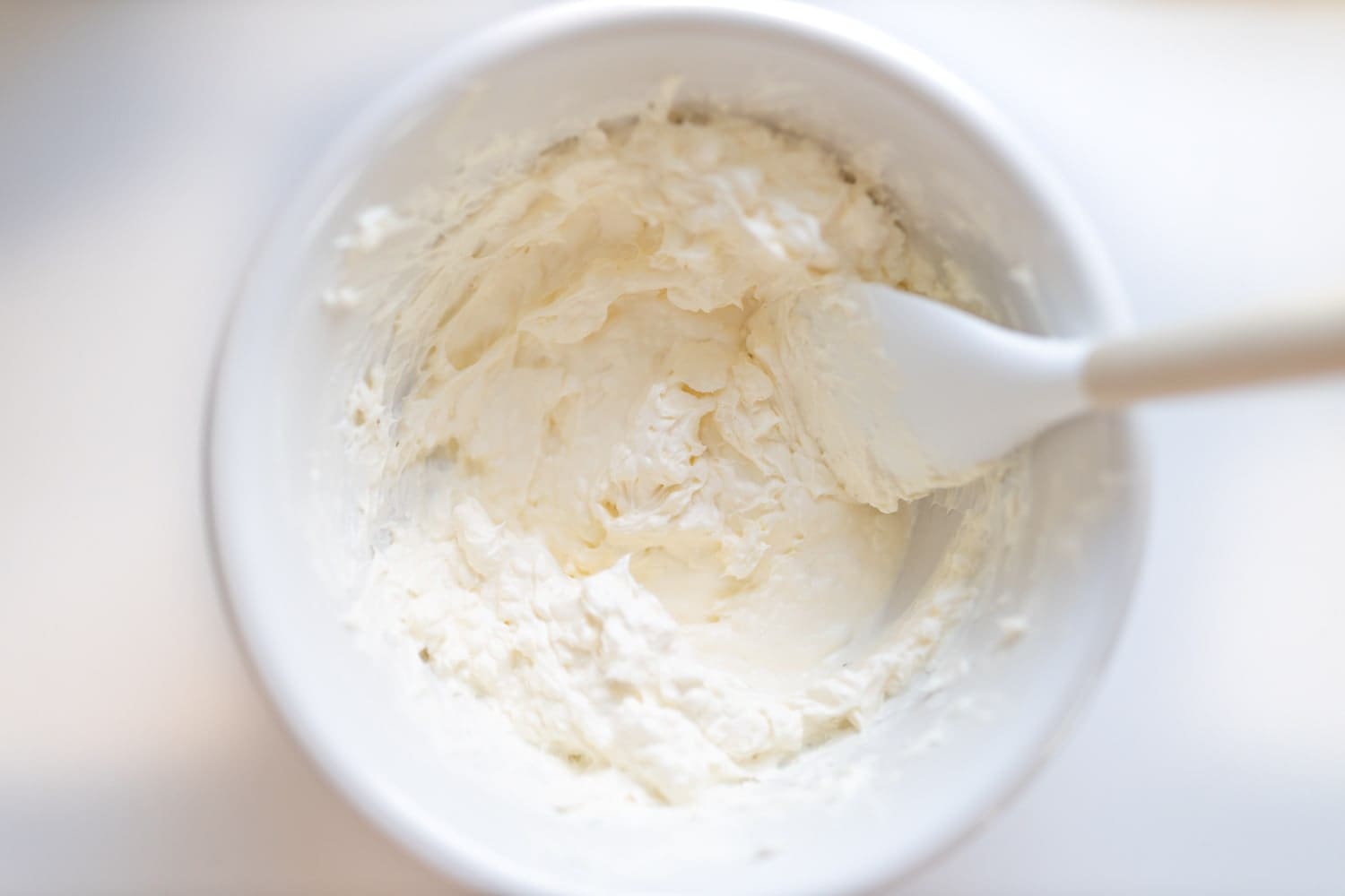 Step one of blogger Stephanie Ziajka's spinach dip with cream cheese recipe on Diary of a Debutante
