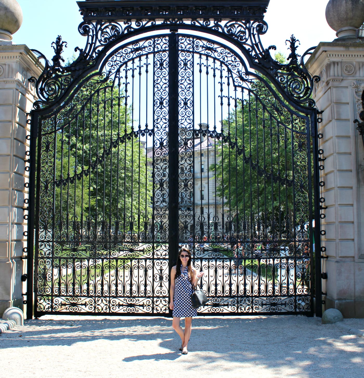 Brit Rose black and white ruffle dress for touring The Breakers in Newport, Rhode Island