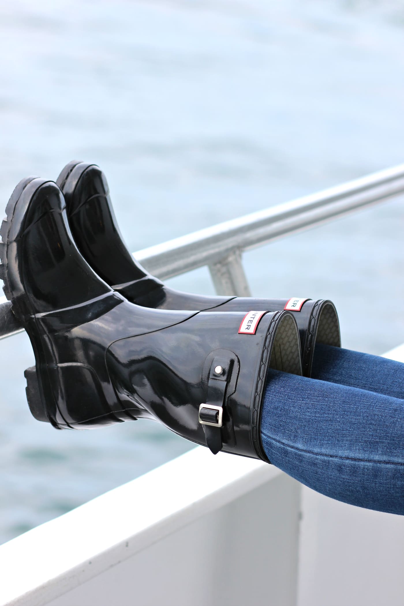 Whale watching in Maine with a J. Crew Factory sleeveless turtleneck, Hunter tain boots, and a handful of Zone Bars