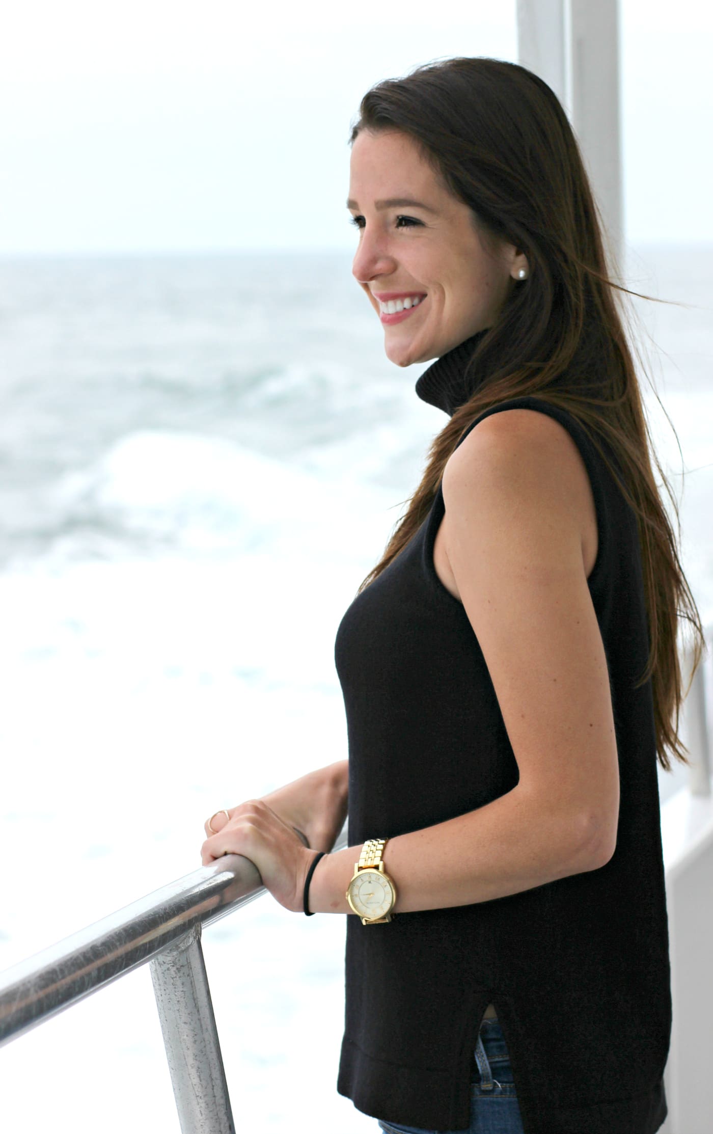 Whale watching in Maine with a J. Crew Factory sleeveless turtleneck, Hunter tain boots, and a handful of Zone Bars