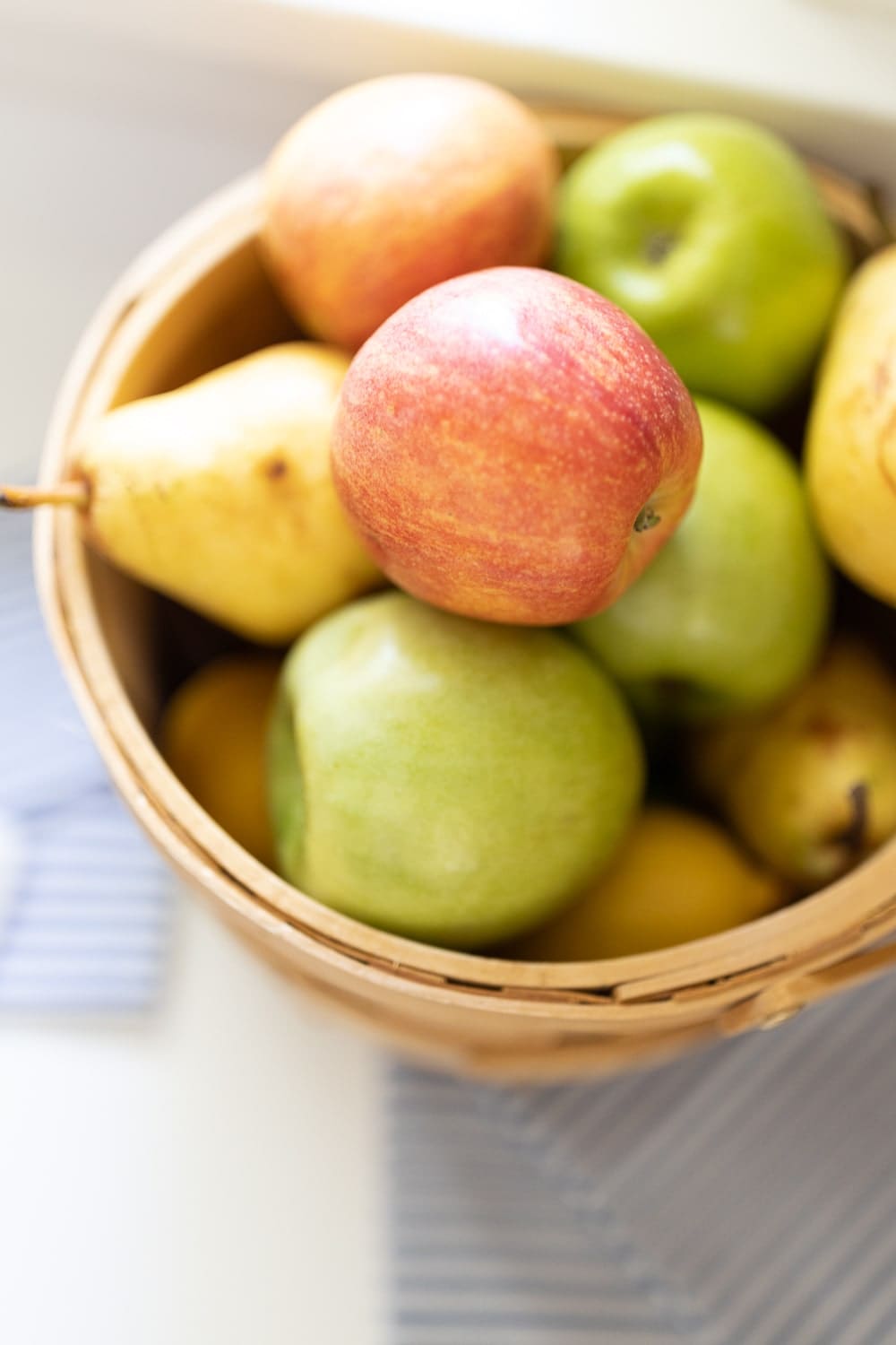Fresh fall fruit in a fruit basket on Diary of a Debutante