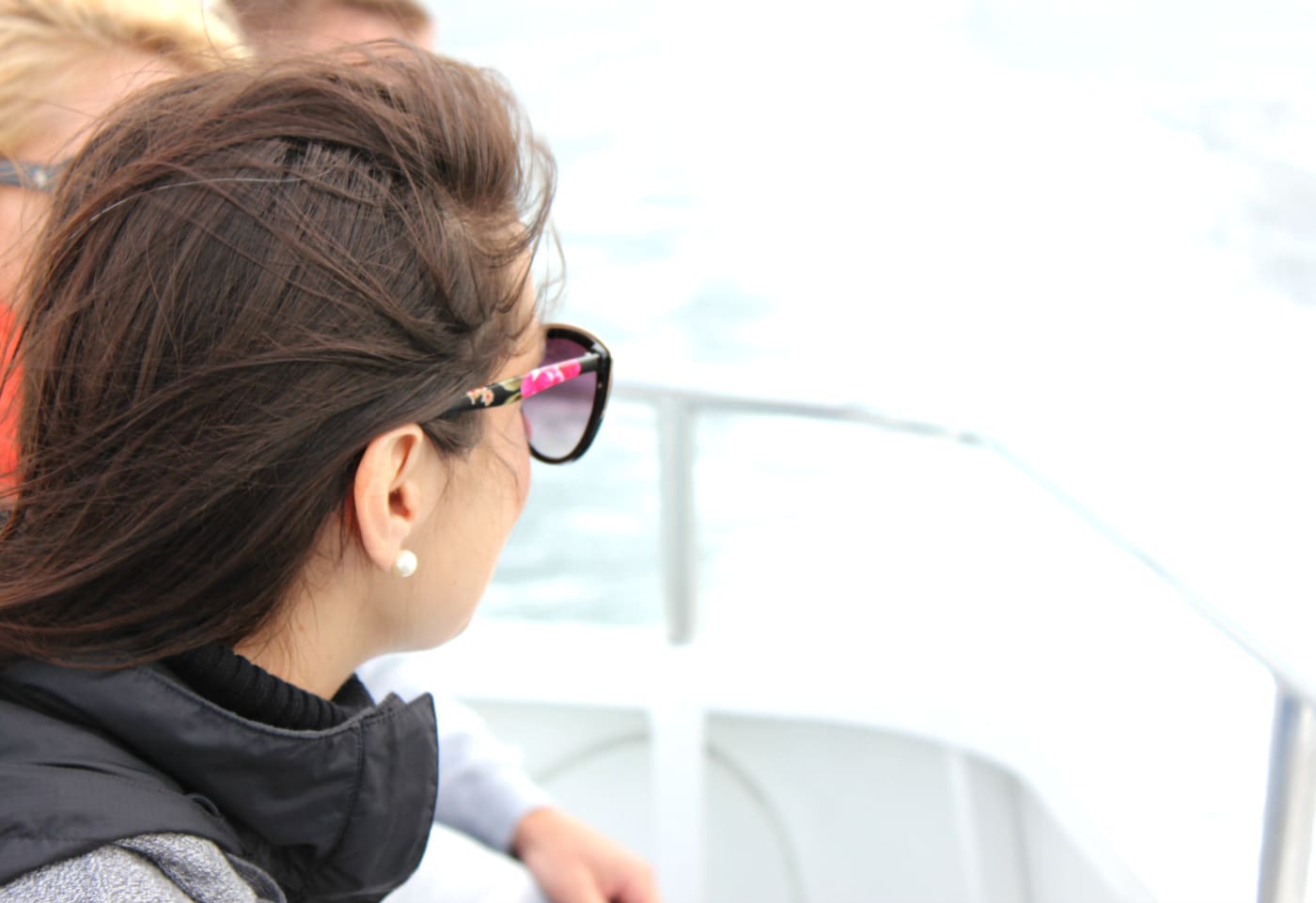 Whale watching in Maine with a J. Crew Factory sleeveless turtleneck, Hunter tain boots, and a handful of Zone Bars