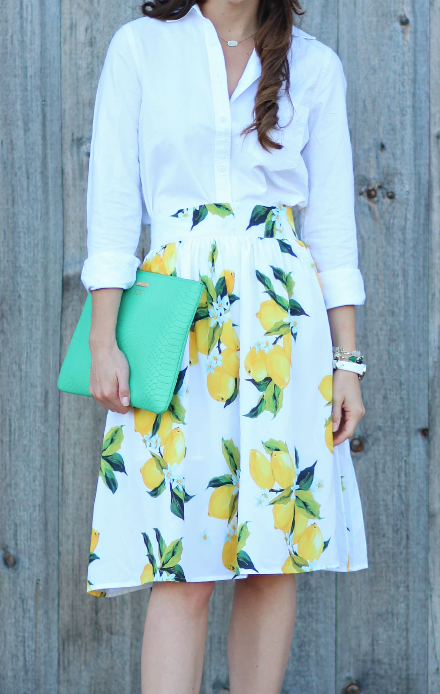 Zaful lemon print skirt with a white J.Crew Factory oxford and kelly green clutch