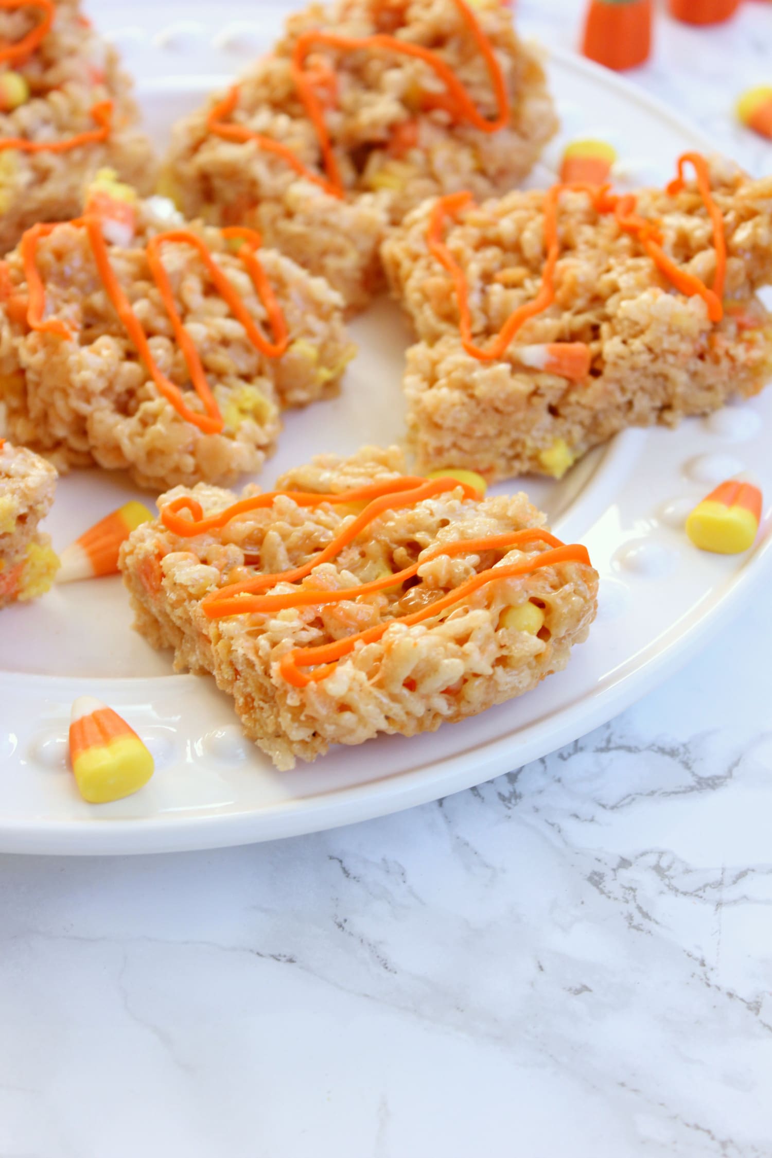 Candy corn rice krispies make a fun, simple, and delicious Halloween snack