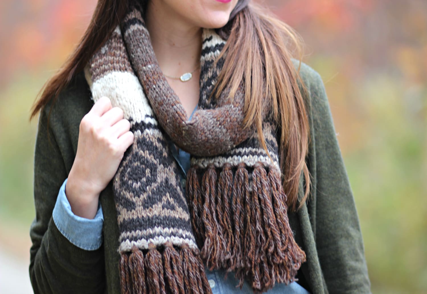 The perfect affordable olive cardigan sweater for chasing leaves in Maine