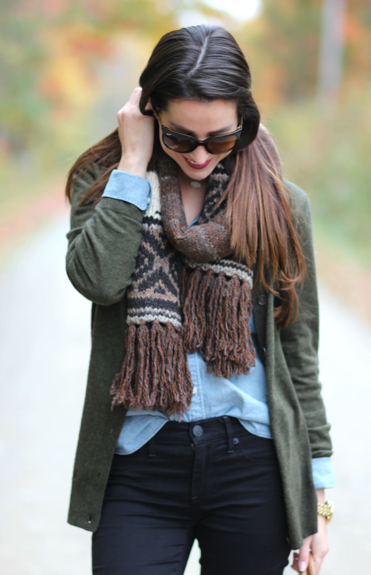 The perfect affordable olive cardigan sweater for chasing leaves in Maine