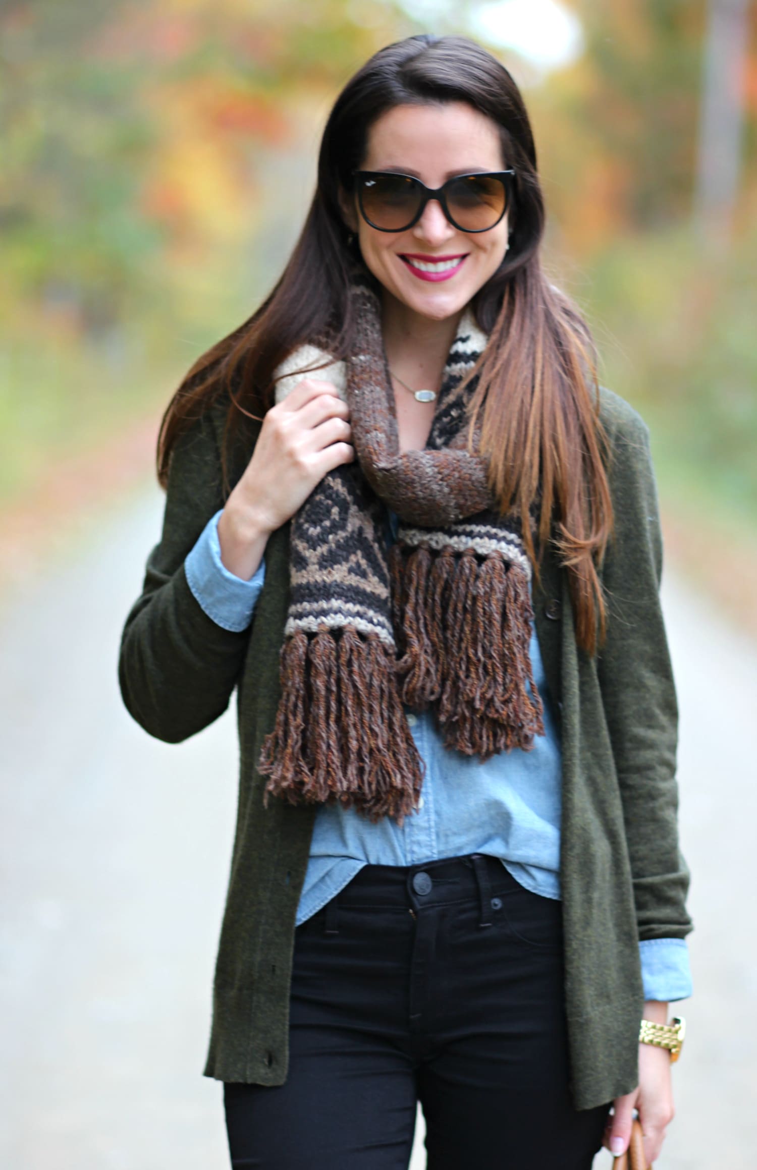 The perfect affordable olive cardigan sweater for chasing leaves in Maine