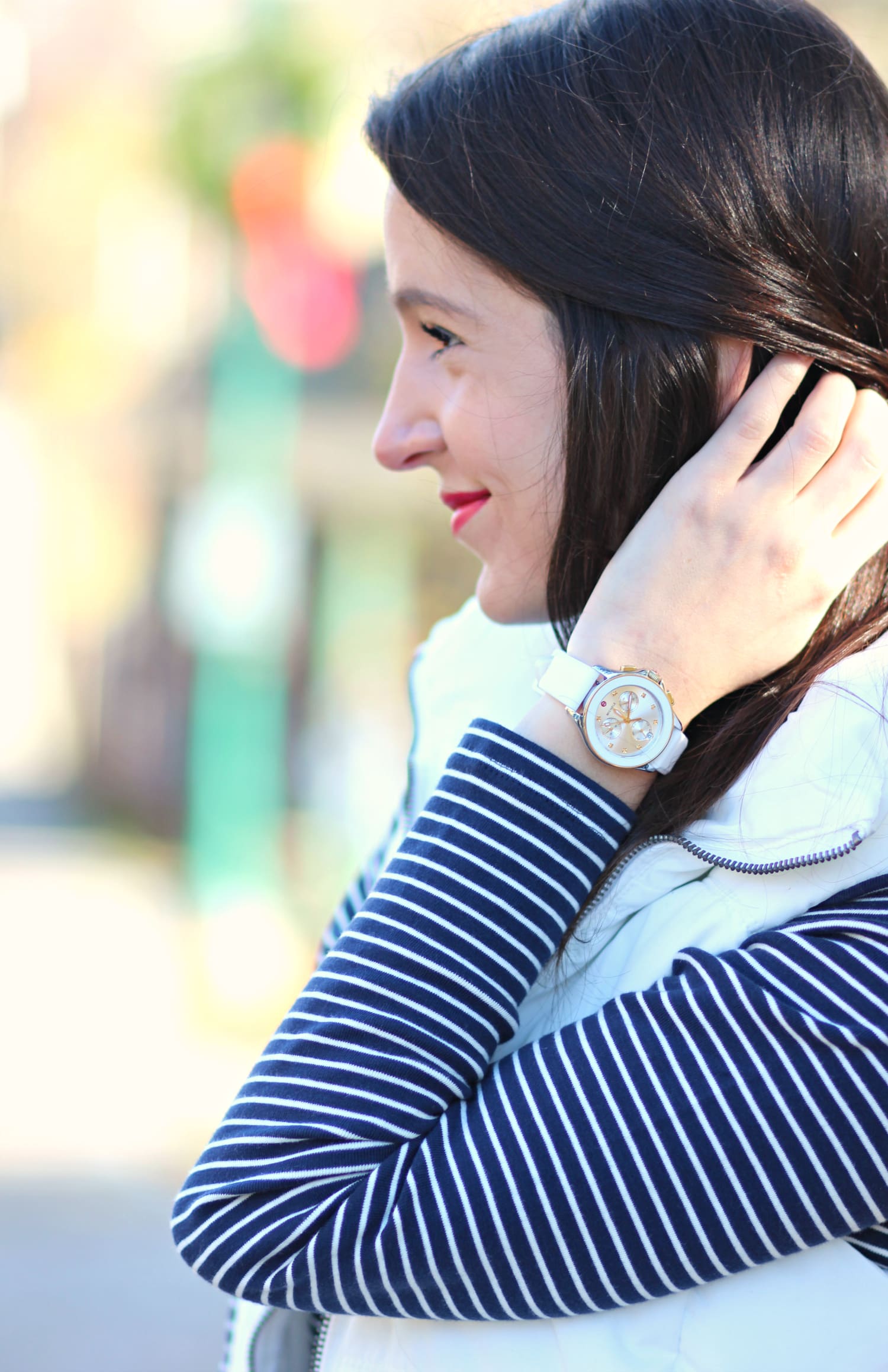 Cute and preppy fall outfit idea with J Brand dark wash flare jeans, Old Navy white puffer vest, and LL Bean striped turtleneck