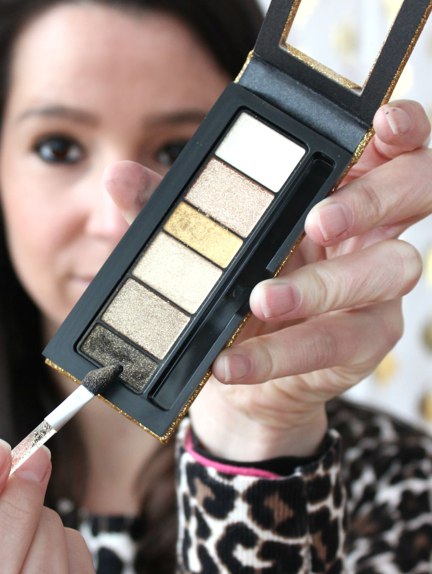 A fun and simple New Year's Eve makeup tutorial featuring affordable drugstore products