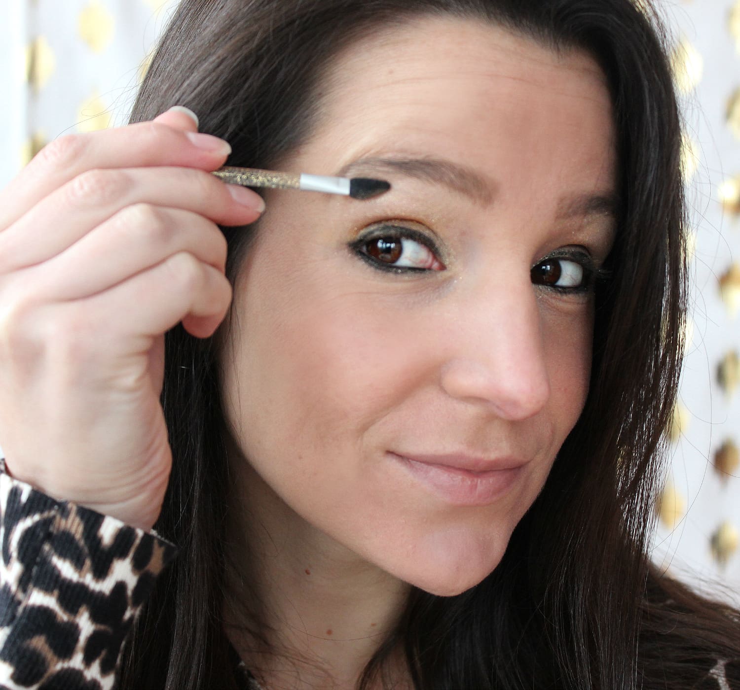 A fun and simple New Year's Eve makeup tutorial featuring affordable drugstore products