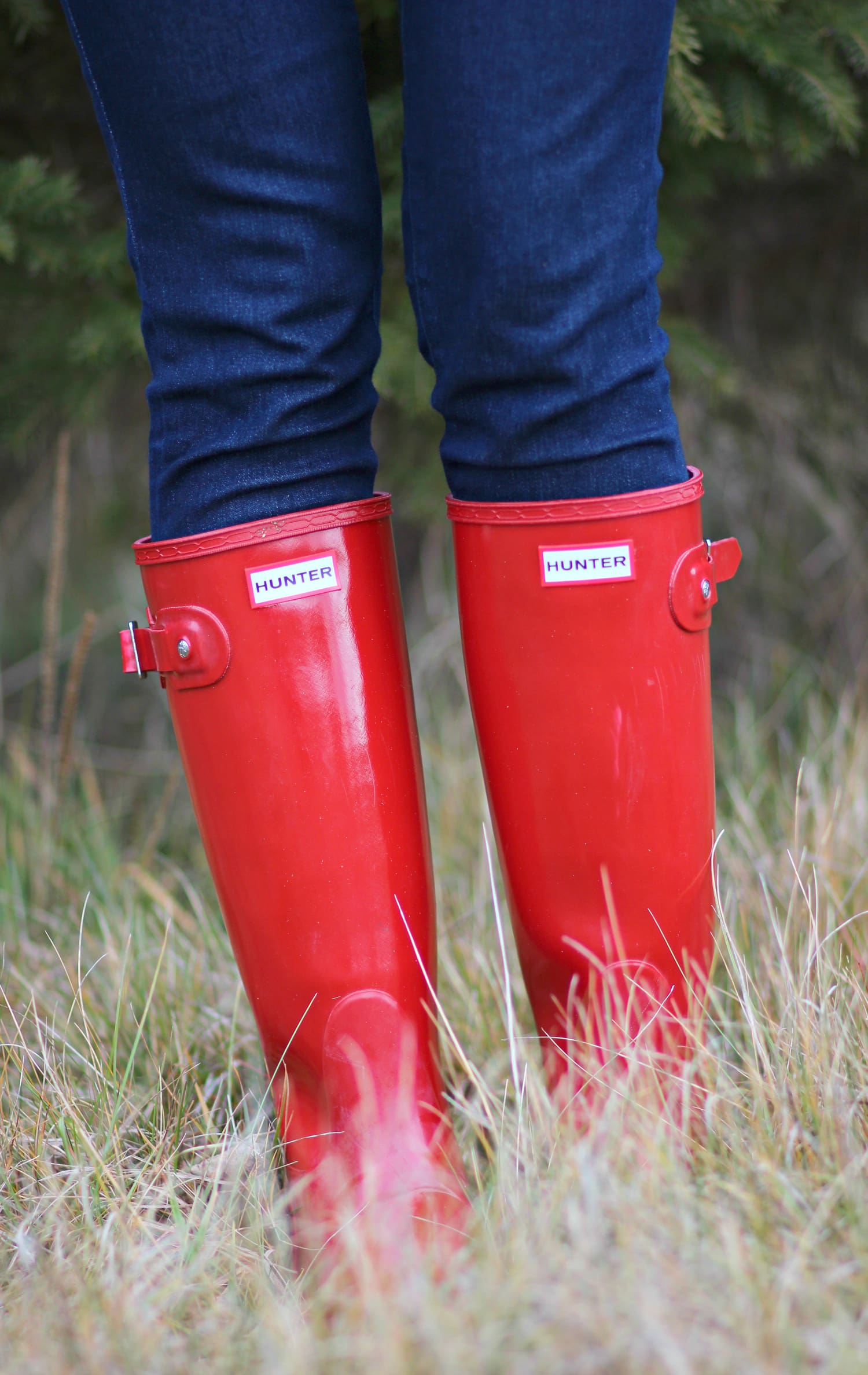 Cutting down our Christmas tree in the perfect affordable quilted red jacket from Crown & Ivory