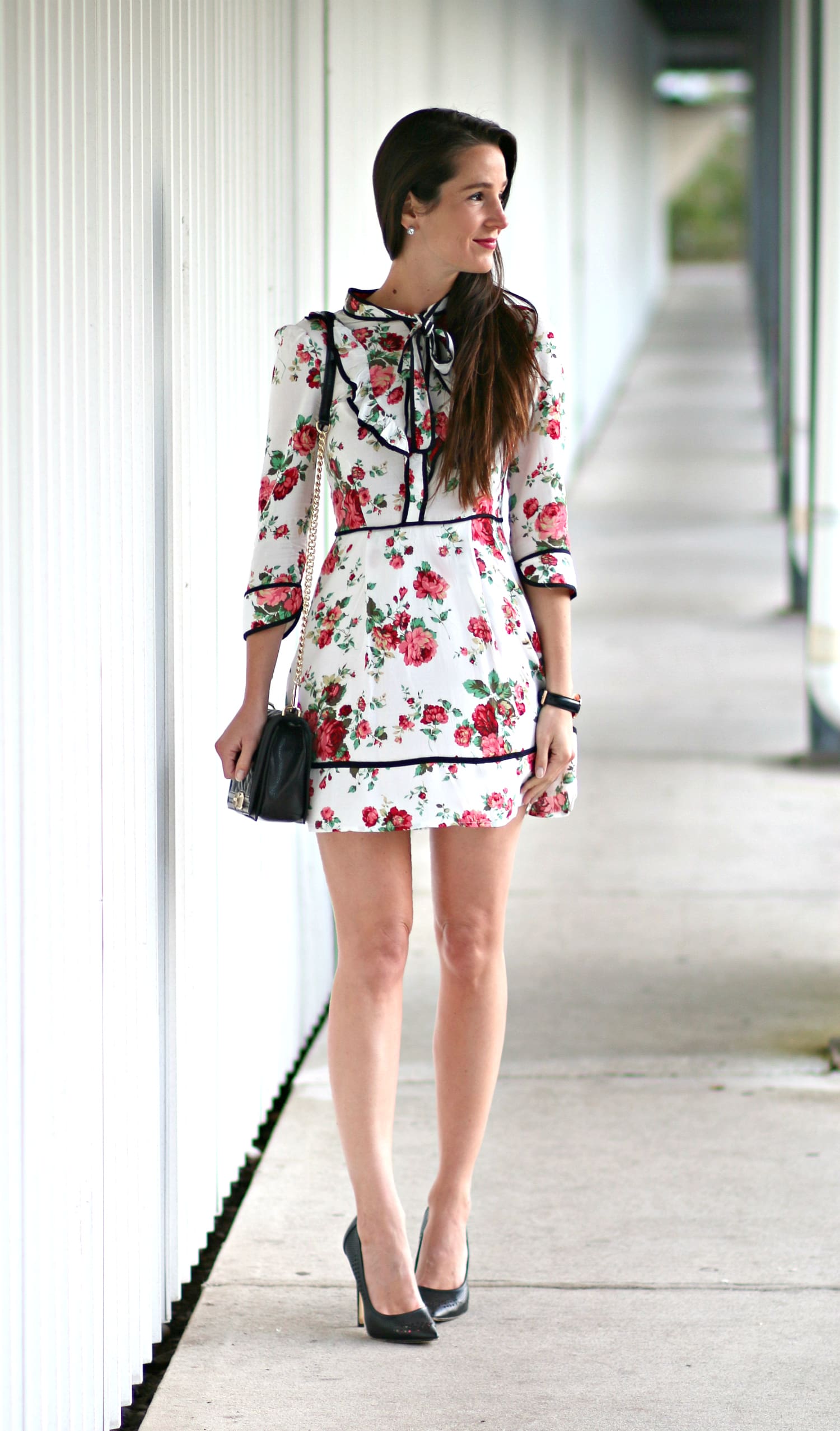 Belle inspired cocktail dress with floral rose print, chic neck tie detailing, and three quarter sleeves