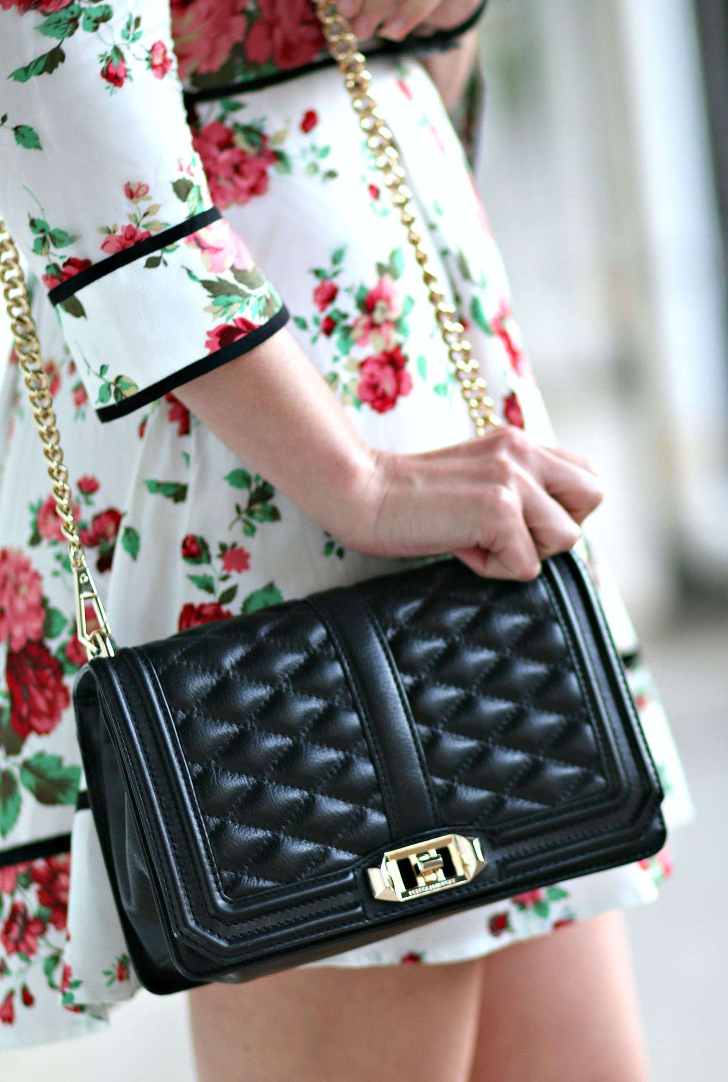 Belle inspired cocktail dress with floral rose print, chic neck tie detailing, and three quarter sleeves