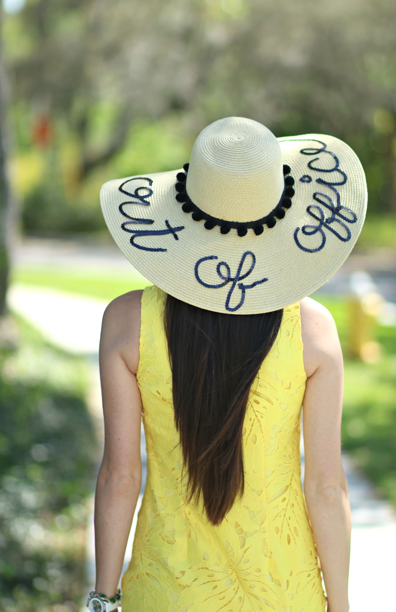 Bright yellow lace leaf pattern shift dress from Banana Republic and "Out of Office" floppy hat