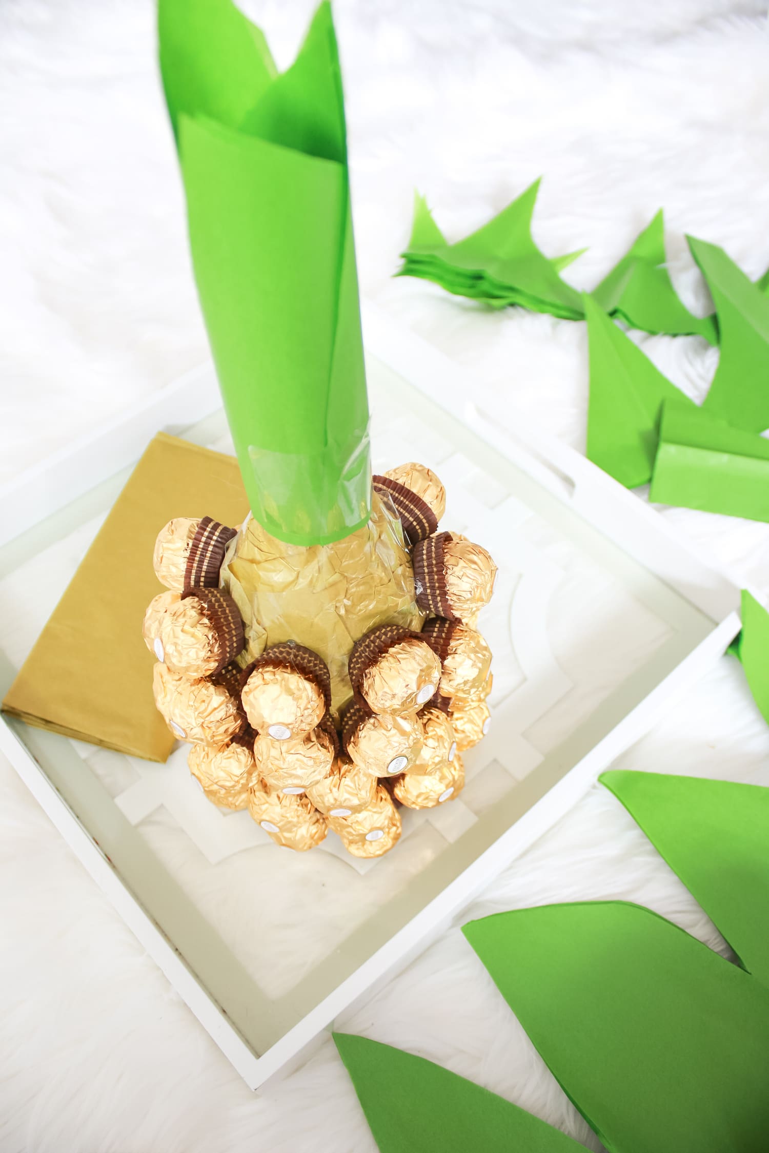 Looking for DIY housewarming gifts? Look no further than this adorable chocolate-covered champagne pineapple by southern blogger Stephanie Ziajka from Diary of a Debutante