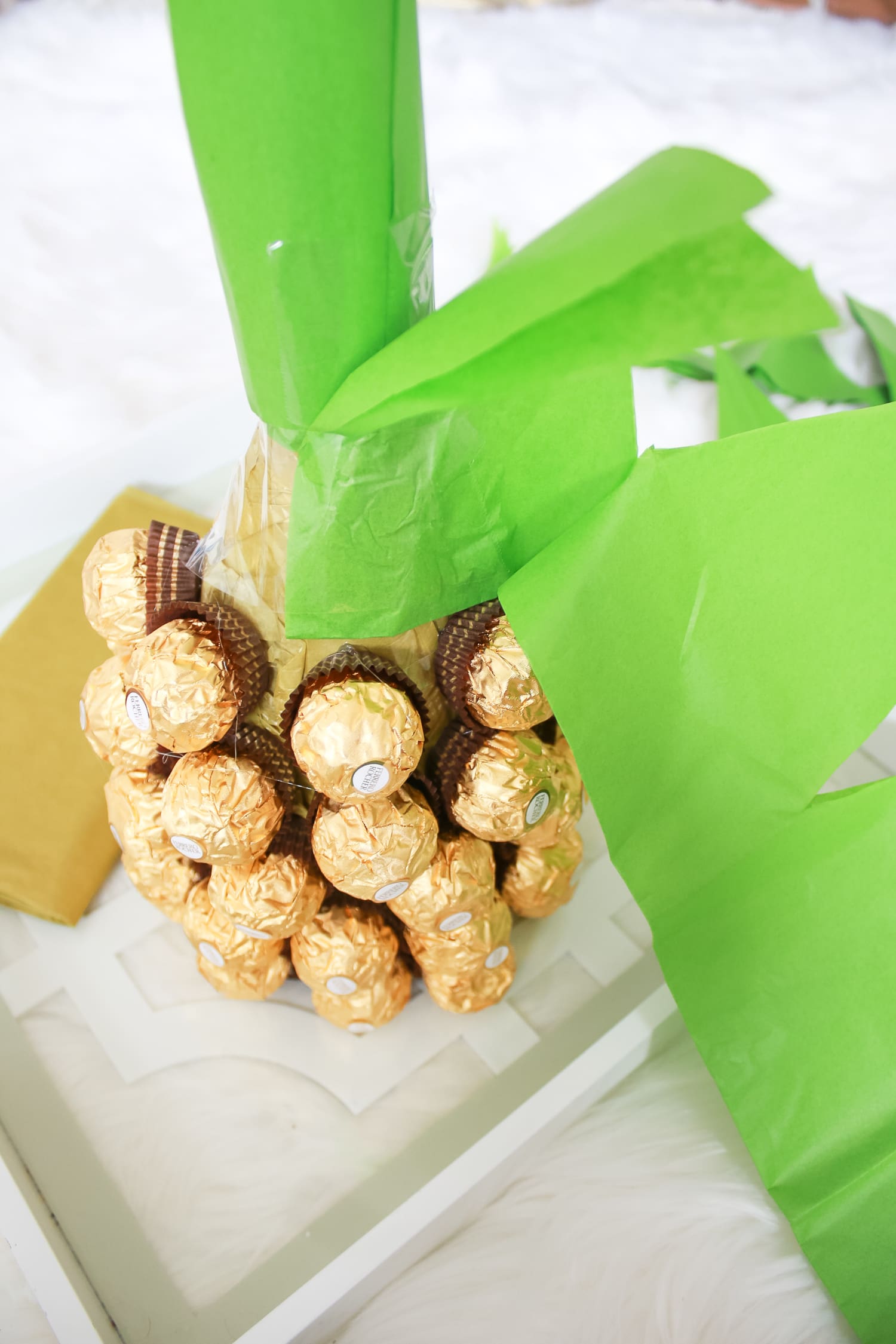 Looking for DIY housewarming gifts? Look no further than this adorable chocolate-covered champagne pineapple by southern blogger Stephanie Ziajka from Diary of a Debutante