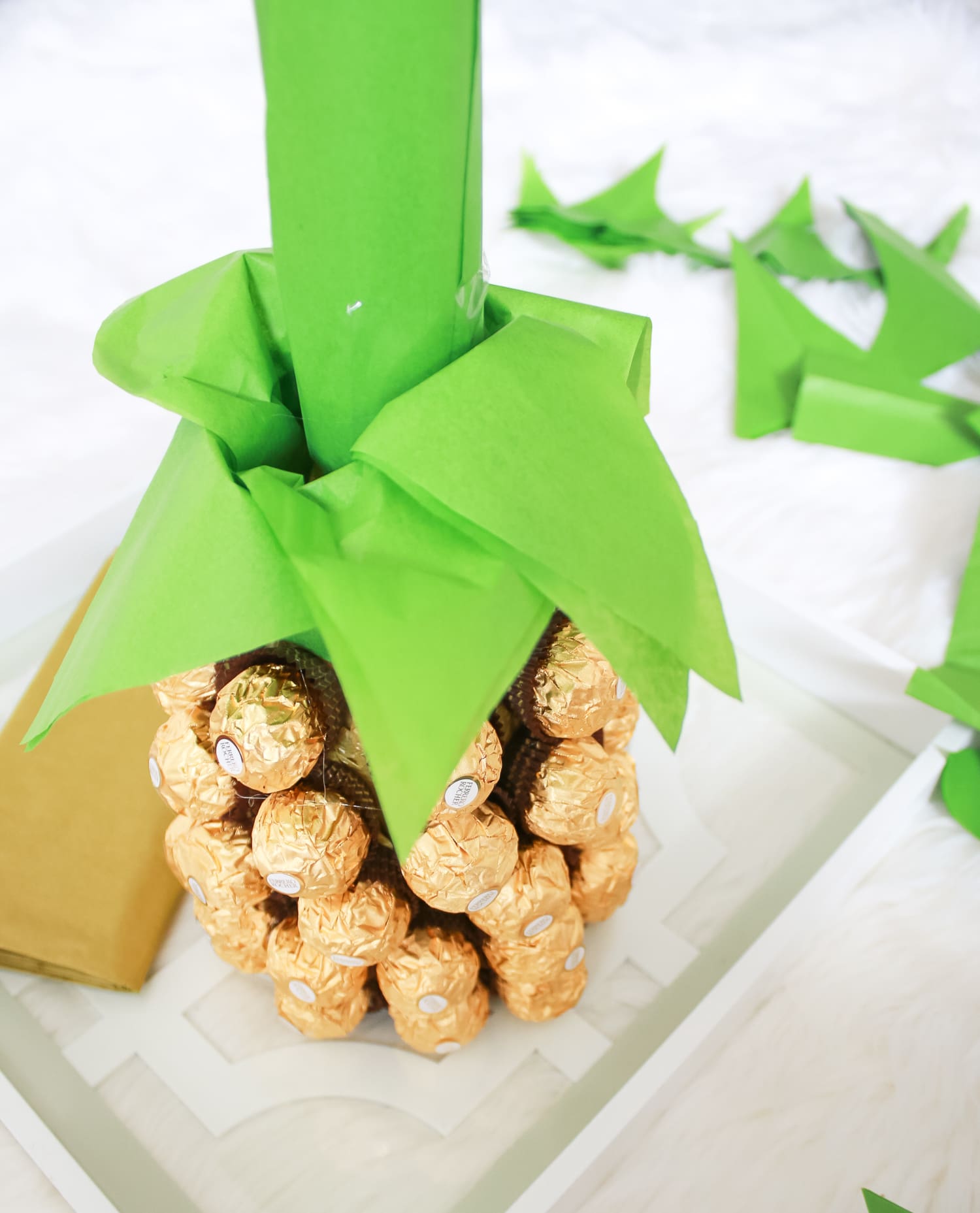 Looking for DIY housewarming gifts? Look no further than this adorable chocolate-covered champagne pineapple by southern blogger Stephanie Ziajka from Diary of a Debutante