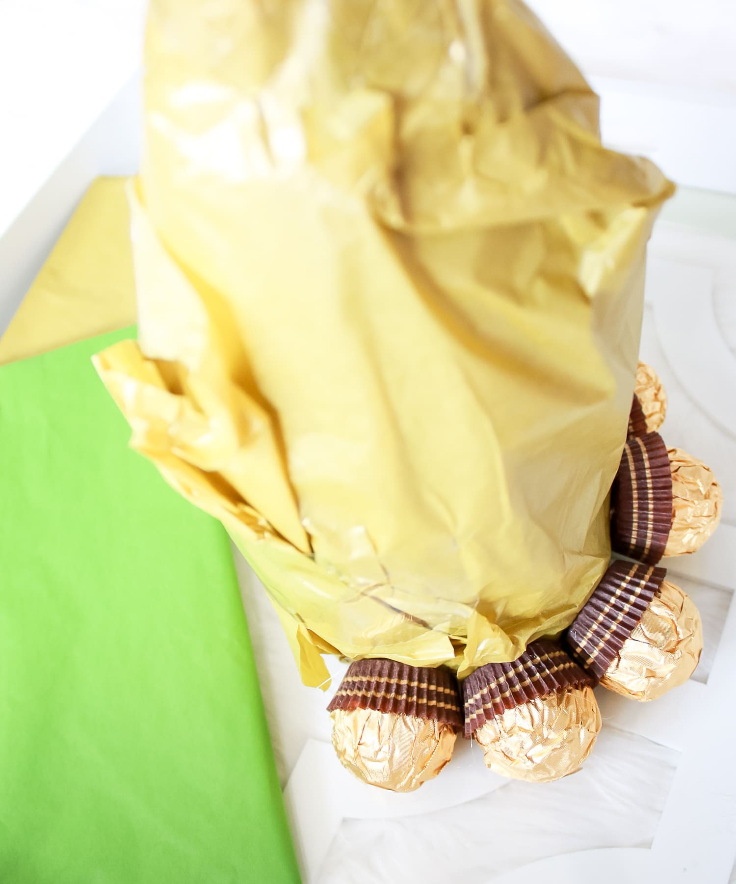 Looking for DIY housewarming gifts? Look no further than this adorable chocolate-covered champagne pineapple by southern blogger Stephanie Ziajka from Diary of a Debutante
