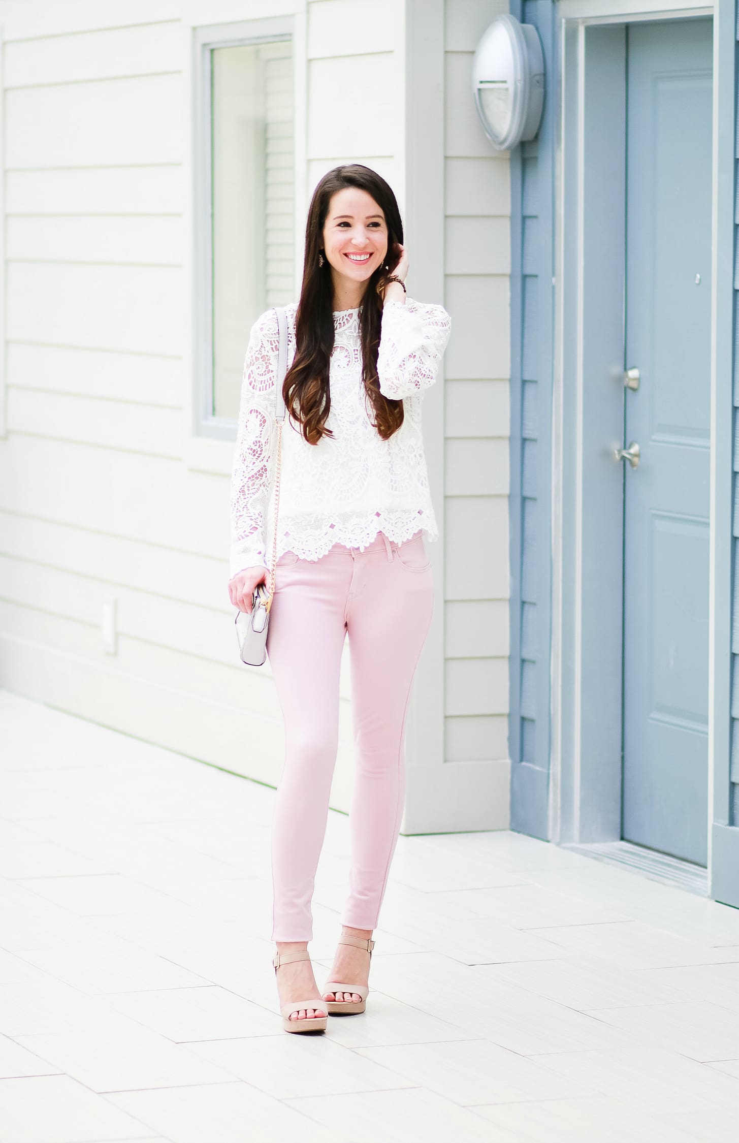 Levi pink skinny jeans with WAYF white lenox lace top, Rebecca Minkoff Avery crossbody bag, Sam Edelman tan block heel sandals, SUGARFIX by Baublebar embellished hoop earrings, and Kate Spade New York Mini Metro Leopard Watch | How to wear pink skinny jeans in the fall plus all the details on Shopbop's End-of-the-Season Sale by fashion blogger Stephanie Ziajka from Diary of a Debutante
