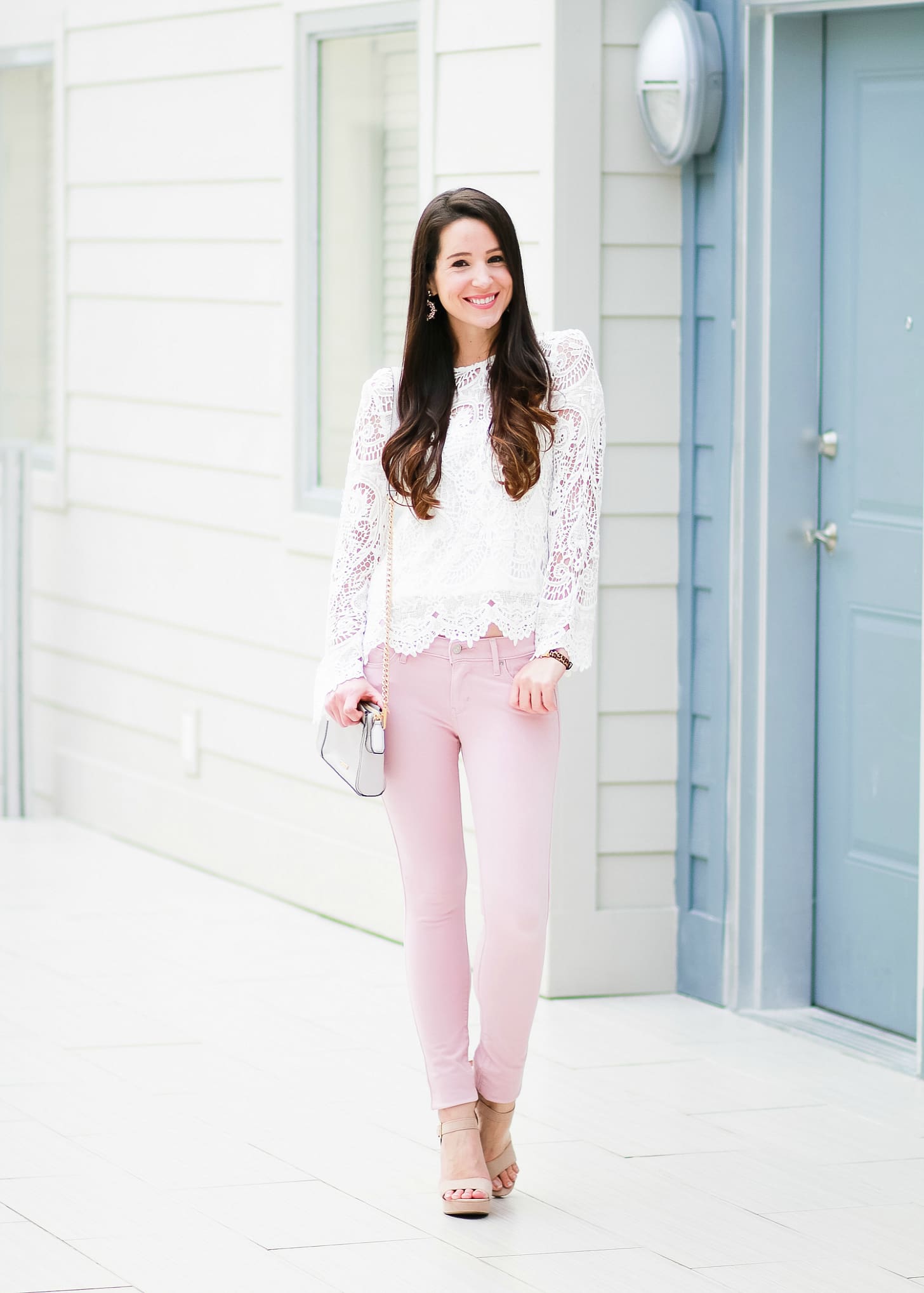Levi pink skinny jeans with WAYF white lenox lace top, Rebecca Minkoff Avery crossbody bag, Sam Edelman tan block heel sandals, SUGARFIX by Baublebar embellished hoop earrings, and Kate Spade New York Mini Metro Leopard Watch | How to wear pink skinny jeans in the fall plus all the details on Shopbop's End-of-the-Season Sale by fashion blogger Stephanie Ziajka from Diary of a Debutante