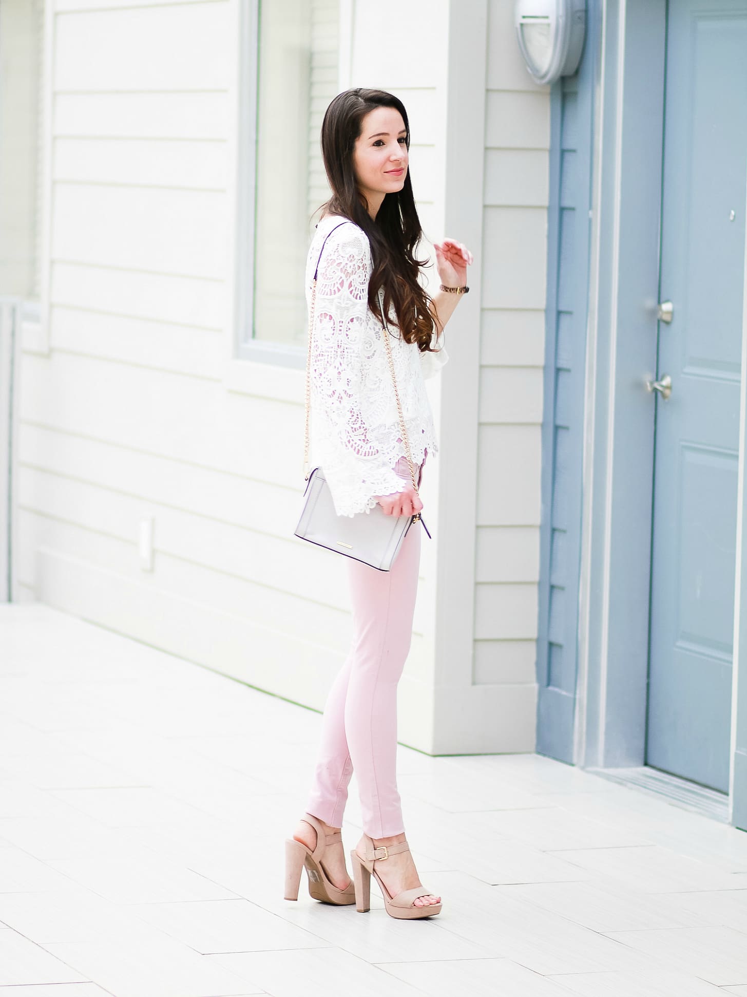 Levi pink skinny jeans with WAYF white lenox lace top, Rebecca Minkoff Avery crossbody bag, Sam Edelman tan block heel sandals, SUGARFIX by Baublebar embellished hoop earrings, and Kate Spade New York Mini Metro Leopard Watch | How to wear pink skinny jeans in the fall plus all the details on Shopbop's End-of-the-Season Sale by fashion blogger Stephanie Ziajka from Diary of a Debutante