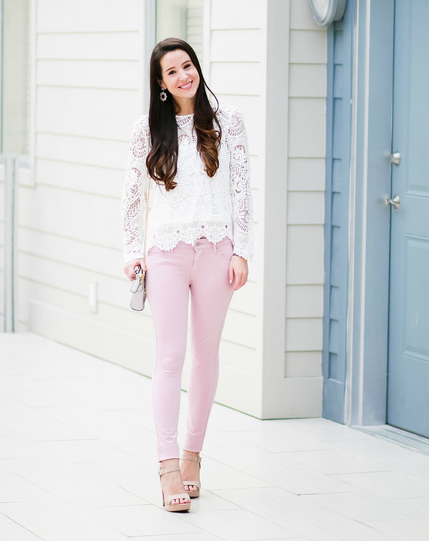 Levi pink skinny jeans with WAYF white lenox lace top, Rebecca Minkoff Avery crossbody bag, Sam Edelman tan block heel sandals, SUGARFIX by Baublebar embellished hoop earrings, and Kate Spade New York Mini Metro Leopard Watch | How to wear pink skinny jeans in the fall plus all the details on Shopbop's End-of-the-Season Sale by fashion blogger Stephanie Ziajka from Diary of a Debutante