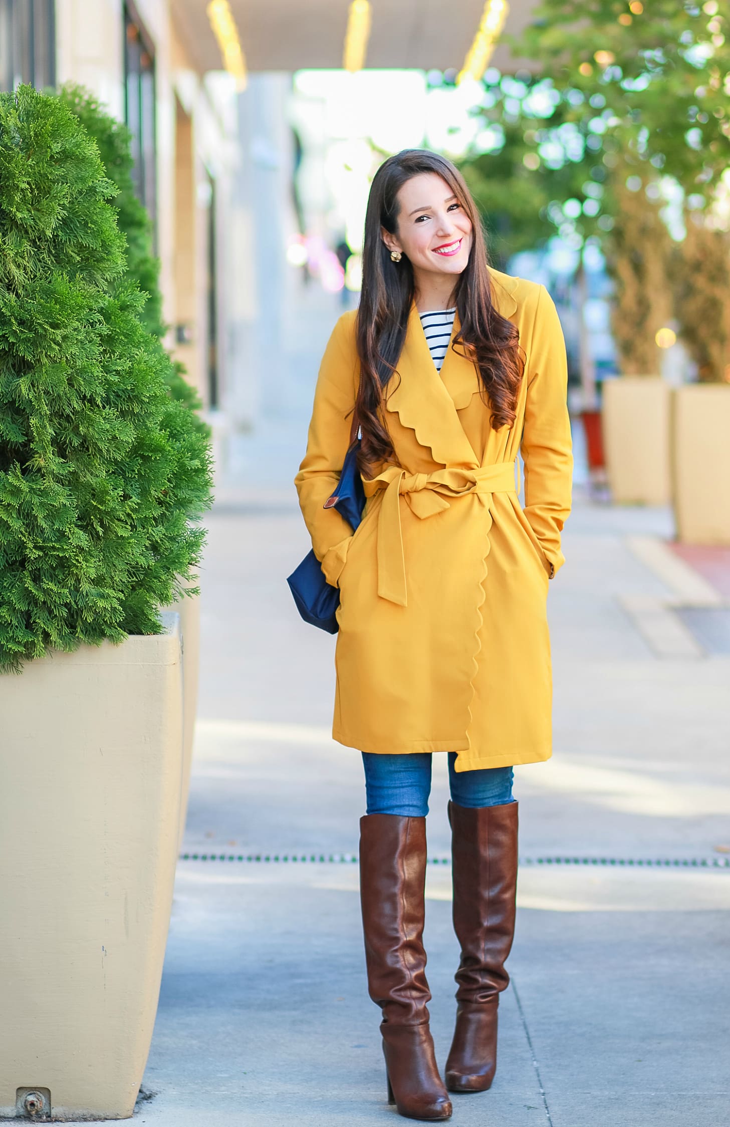 Marigold scalloped coat with AG skinny jeans, English Factory striped top, Nine West brown tall boots, and large navy Longchamp tote | Color Crush: Marigold Scalloped Coat by fashion blogger Stephanie Ziajka from Diary of a Debutante
