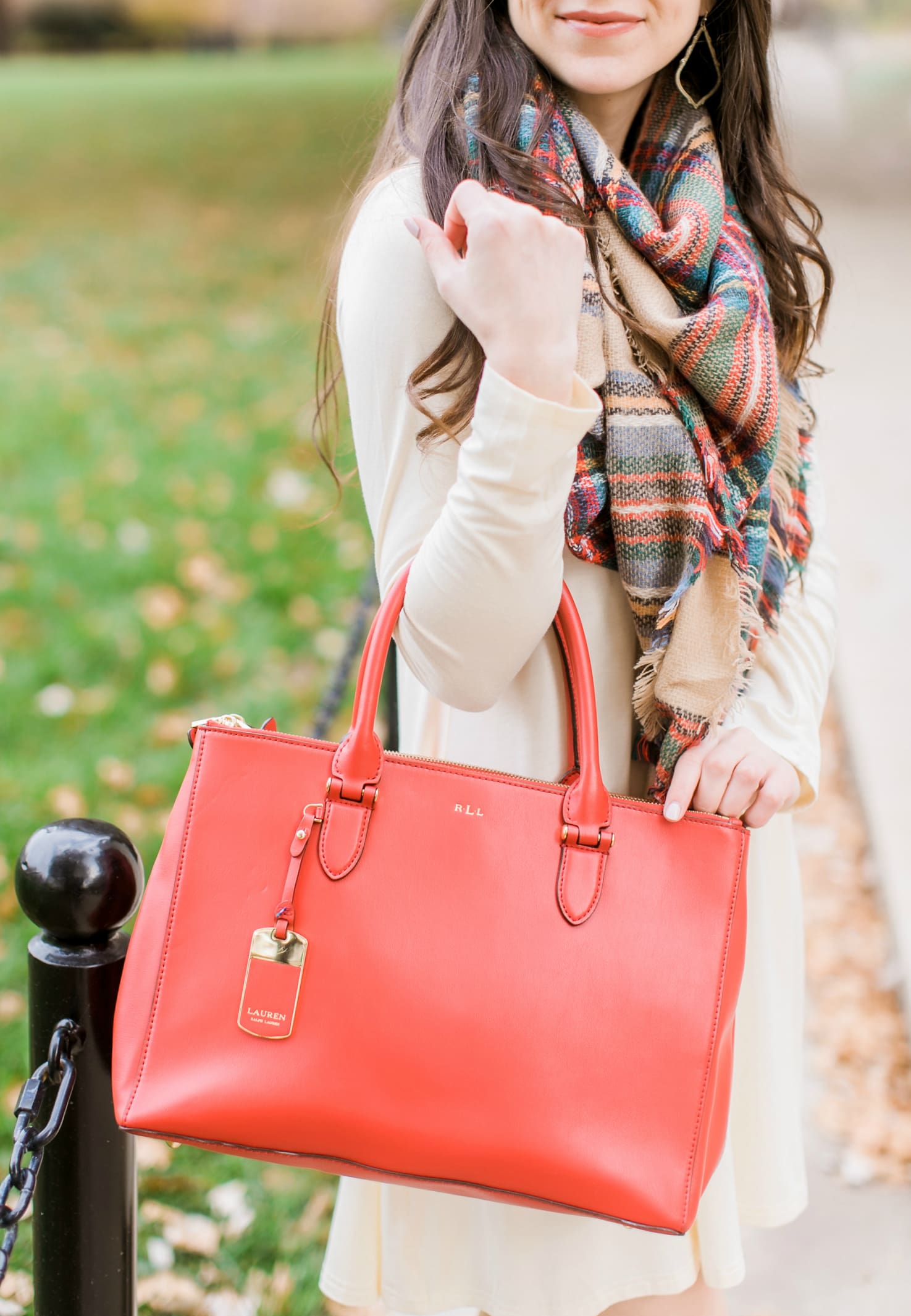Beige cotton swing dress with tartan blanket scarf, Free People cognac OTK boots, red Ralph Lauren handbag, and Kendra Scott Sophee earrings | Casual holiday outfit idea | 10 tips for looking your best on camera | Tips for Looking Your Best in Holiday Photos from fashion blogger Stephanie Ziajka of Diary of a Debutante