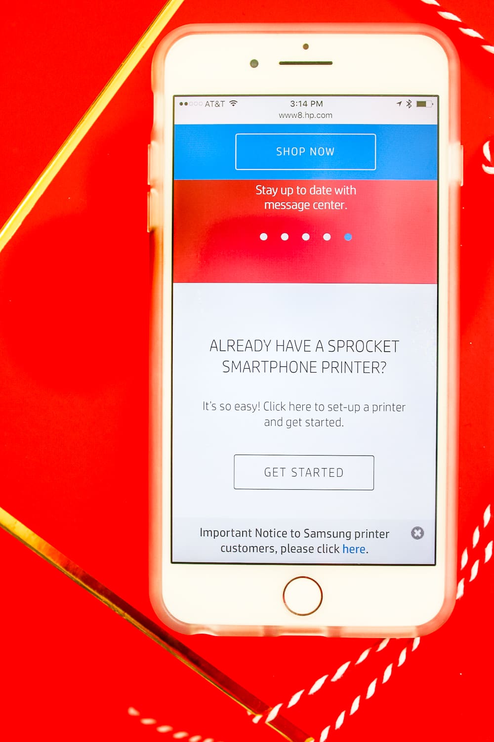 Red HP Sprocket Photo Printer, which makes a perfect stocking stuffer and is the best instant photo printer for events and travel by southern blogger Stephanie Ziajka from Diary of a Debutante
