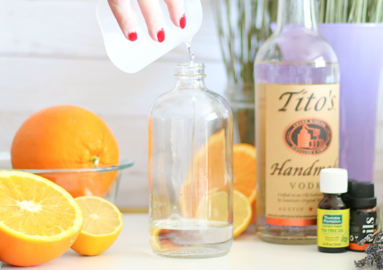 DIY essential oil linen spray by southern fashion blogger Stephanie Ziajka from Diary of a Debutante, DIY laundry spray with lavender, sweet orange, and tea tree oil from Thursday Plantation