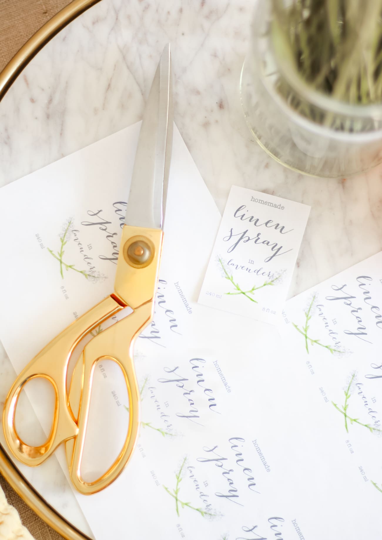 DIY essential oil linen spray by southern fashion blogger Stephanie Ziajka from Diary of a Debutante, DIY laundry spray with lavender, sweet orange, and tea tree oil from Thursday Plantation