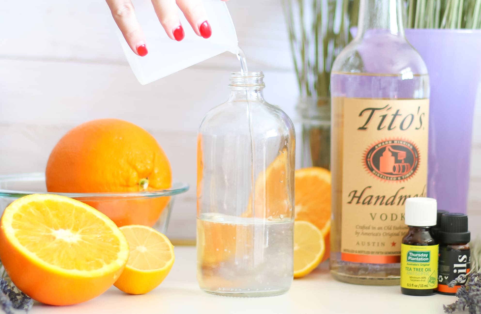 DIY essential oil linen spray by southern fashion blogger Stephanie Ziajka from Diary of a Debutante, DIY laundry spray with lavender, sweet orange, and tea tree oil from Thursday Plantation