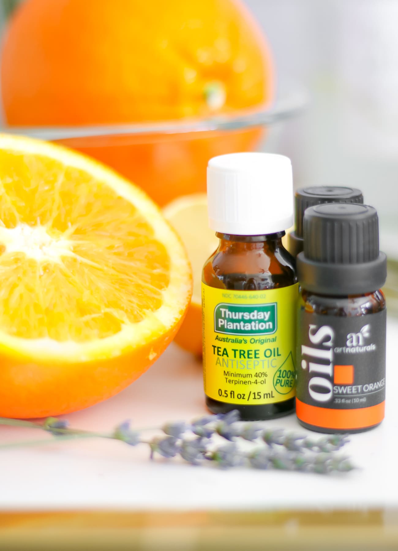 DIY essential oil linen spray by southern fashion blogger Stephanie Ziajka from Diary of a Debutante, DIY laundry spray with lavender, sweet orange, and tea tree oil from Thursday Plantation