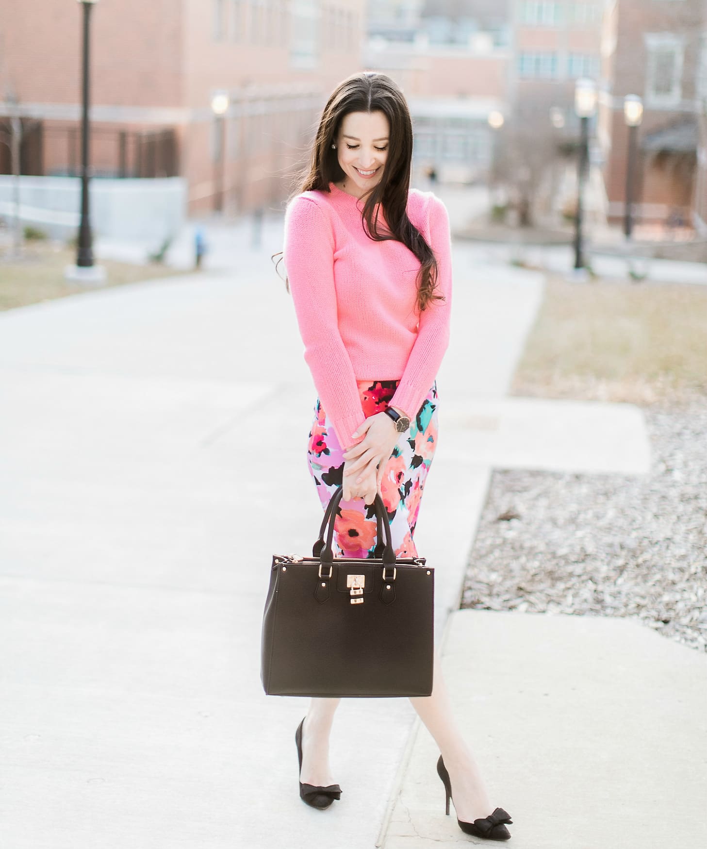 watercolor floral pencil skirt from The Mint Julep Boutique with pink J.Crew Factory crewneck sweater, black bow pumps, Dasein black satchel handbag, and black Daniel Wellington Classic Petite Sheffield watch, how to wear a long pencil skirt, Watercolor Blooms: How to Wear a Floral Pencil Skirt by fashion blogger Stephanie Ziajka from Diary of a Debutante, Catherine Rhodes Photography