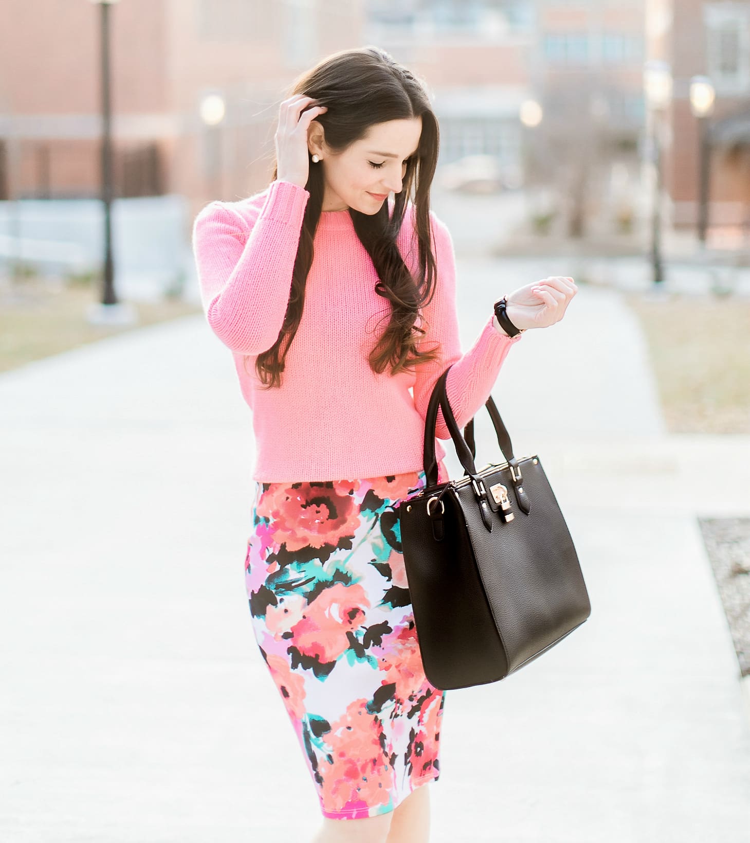 watercolor floral pencil skirt from The Mint Julep Boutique with pink J.Crew Factory crewneck sweater, black bow pumps, Dasein black satchel handbag, and black Daniel Wellington Classic Petite Sheffield watch, how to wear a long pencil skirt, Watercolor Blooms: How to Wear a Floral Pencil Skirt by fashion blogger Stephanie Ziajka from Diary of a Debutante, Catherine Rhodes Photography