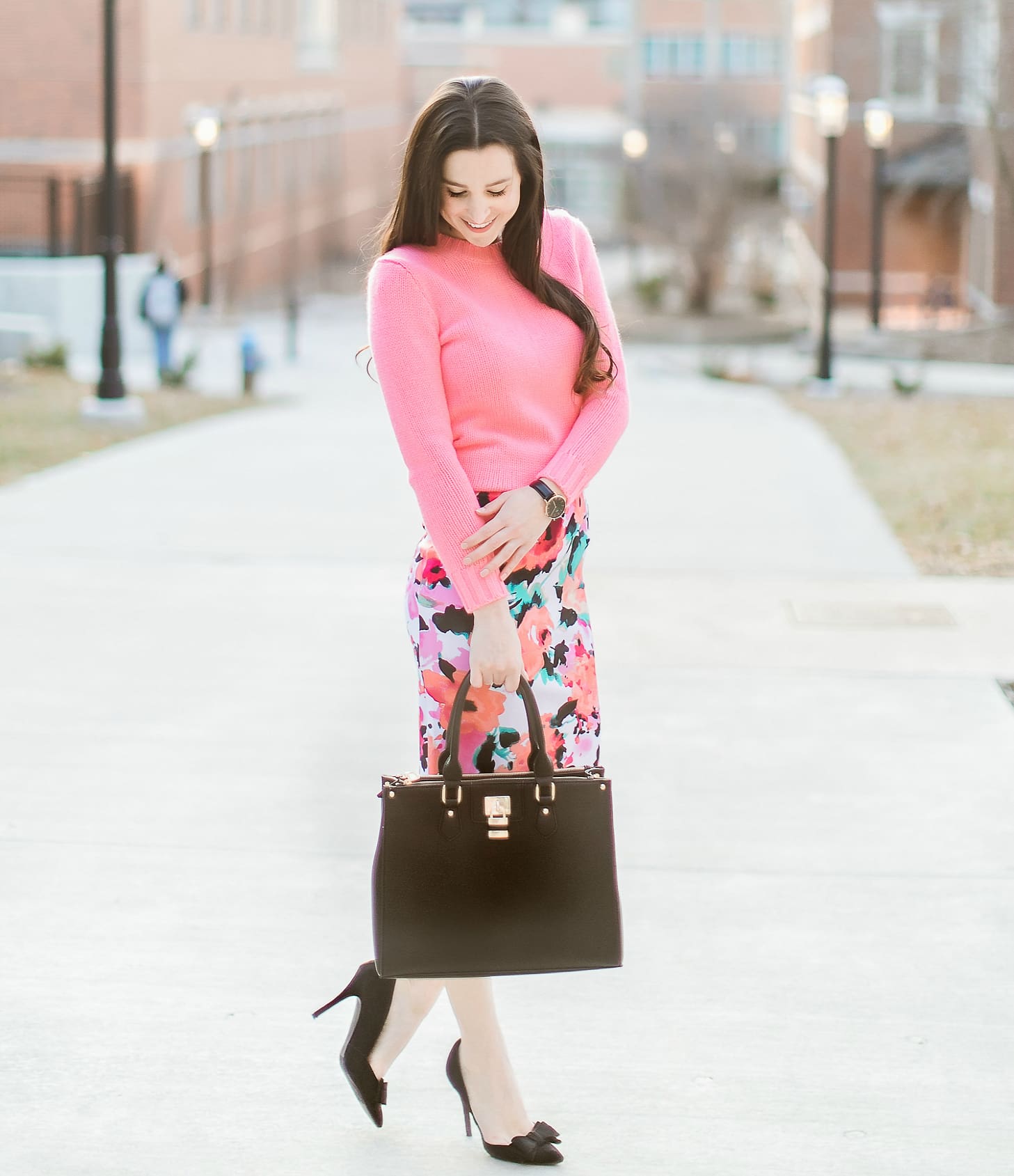 watercolor floral pencil skirt from The Mint Julep Boutique with pink J.Crew Factory crewneck sweater, black bow pumps, Dasein black satchel handbag, and black Daniel Wellington Classic Petite Sheffield watch, how to wear a long pencil skirt, Watercolor Blooms: How to Wear a Floral Pencil Skirt by fashion blogger Stephanie Ziajka from Diary of a Debutante, Catherine Rhodes Photography
