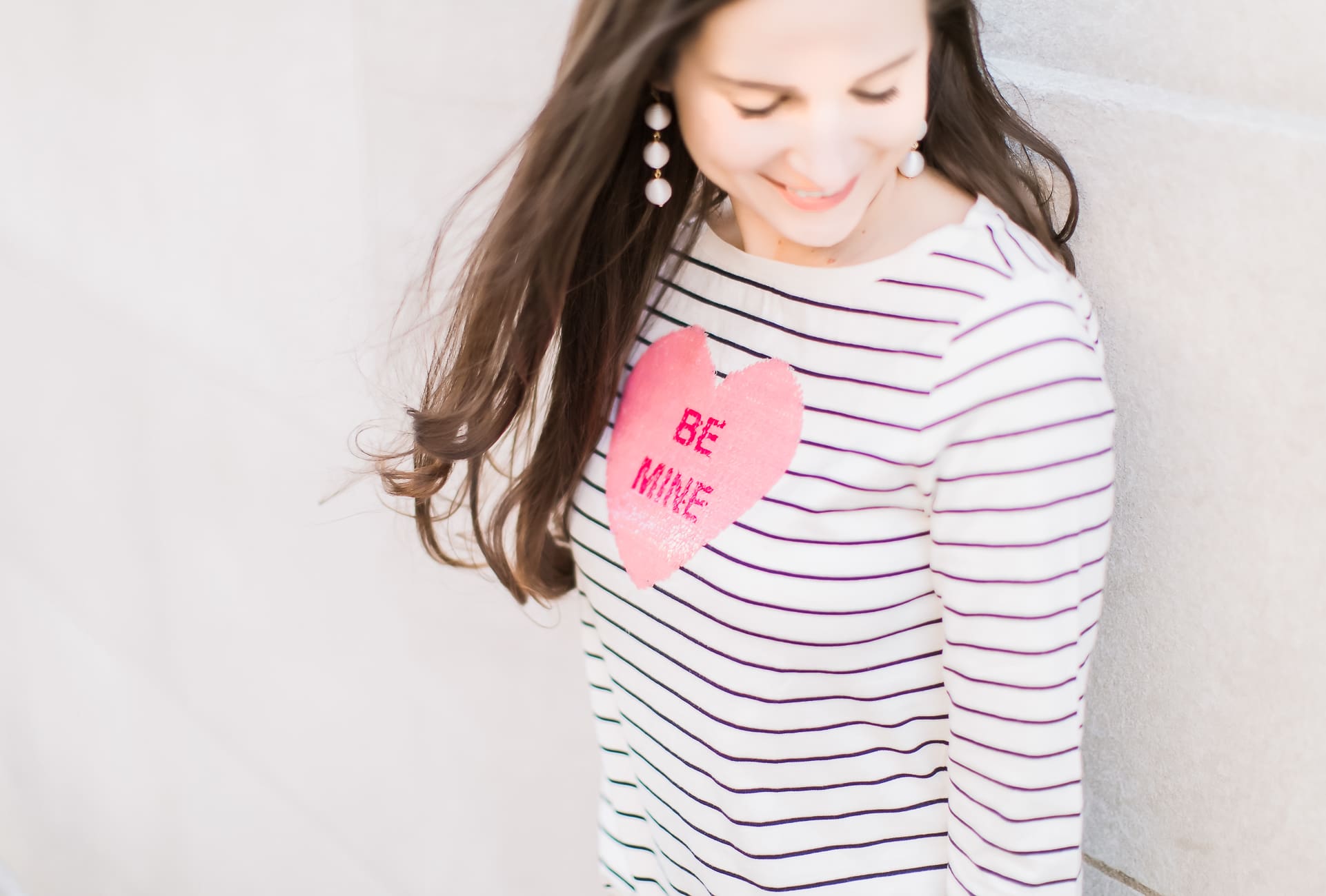 How to enjoy Valentine's Day as a single gal by fashion blogger Stephanie Ziajka from Diary of a Debutante, what to do on Valentine's Day when you are single, how to spend Valentine's Day alone | Talbots striped Be Mine heart tee with navy Lilly Pulitzer capri pants, Vera Bradley white peony Mallory Tote, Sugarfix by Baublebar white triad ball drop earrings, navy striped Daniel Wellington watch, and Sam Edelman nude patent leather pumps
