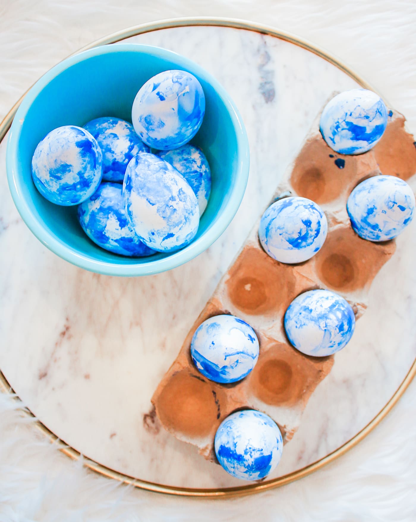 Easter Flair: DIY Blue Marbled Easter Eggs by southern lifestyle blogger Stephanie Ziajka from Diary of a Debutante, Southern Living projects, marbled easter eggs, nail polish easter eggs, diy marbled easter eggs, blue marbled easter eggs