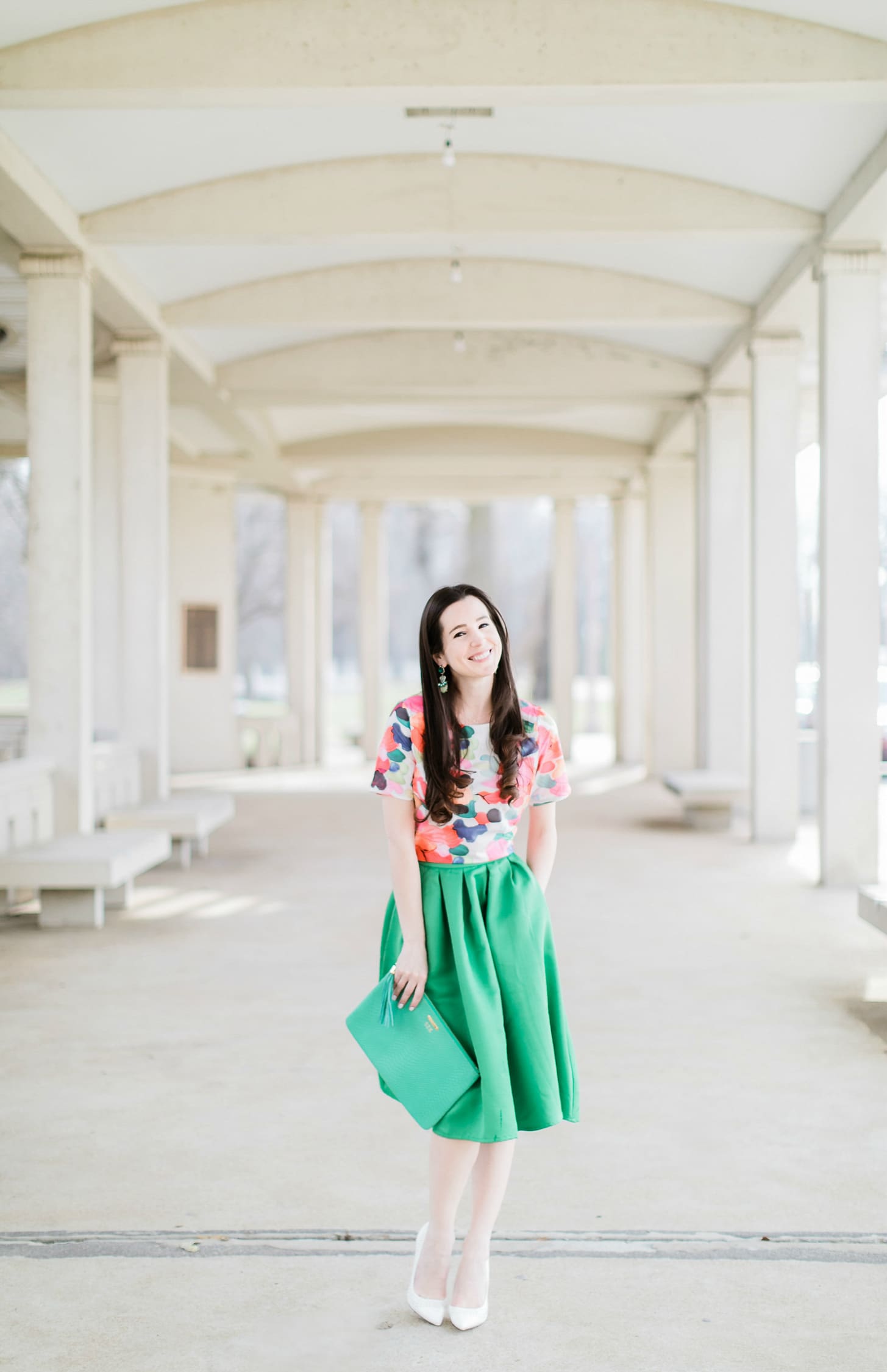Why We Should Embrace Modesty in Modern Fashion by southern fashion blogger Stephanie Ziajka from Diary of a Debutante, kelly green a-line skirt styled with a colorful calico print crop top, white Sam Edelman pointed toe pumps, and a green monogrammed GiGi New York Uber clutch, modest outfit for women, modest dresses and skirts for women