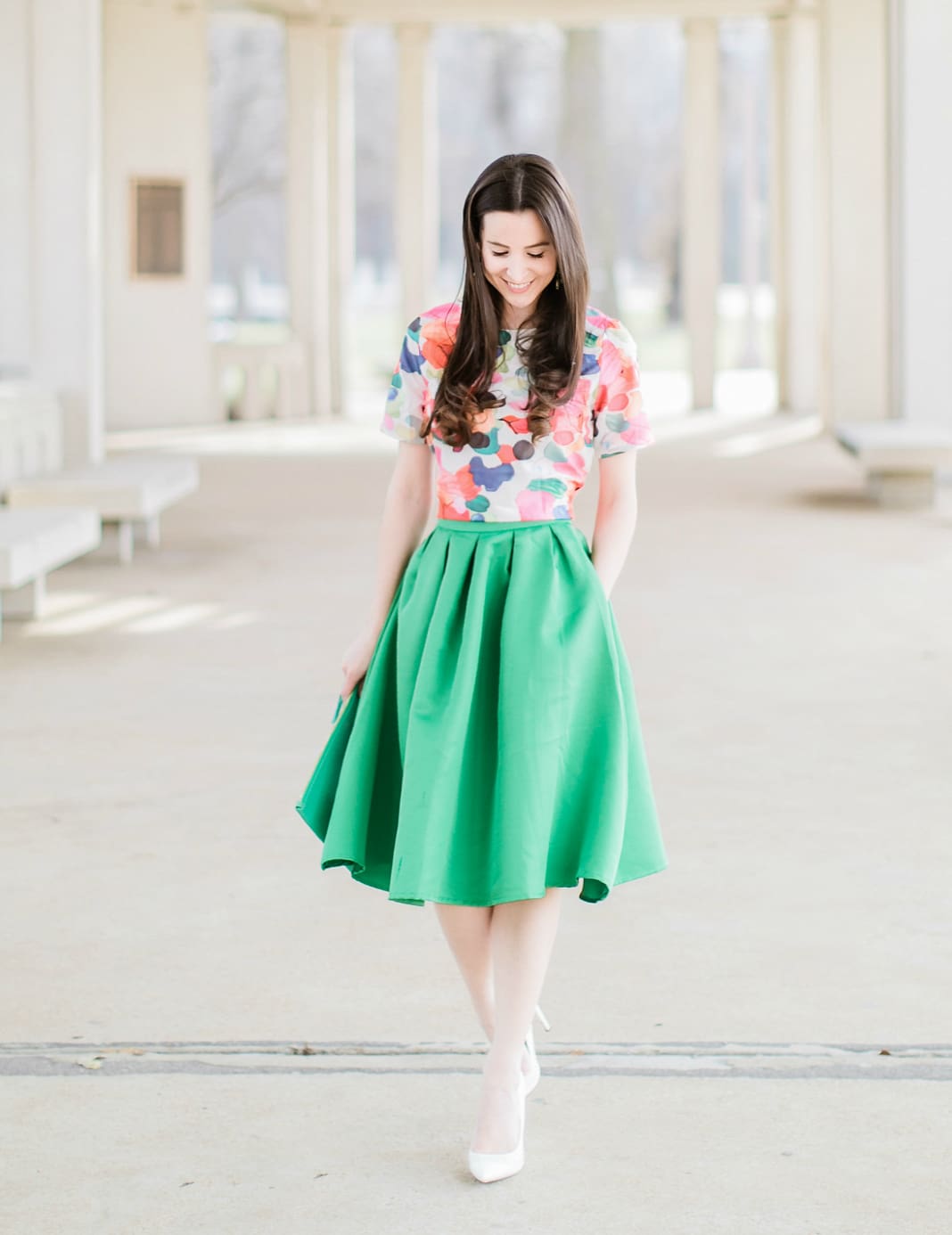 Why We Should Embrace Modesty in Modern Fashion by southern fashion blogger Stephanie Ziajka from Diary of a Debutante, kelly green a-line skirt styled with a colorful calico print crop top, white pointed toe pumps, and a green monogrammed GiGi New York Uber clutch, modest outfit for women, modest dresses and skirts for women