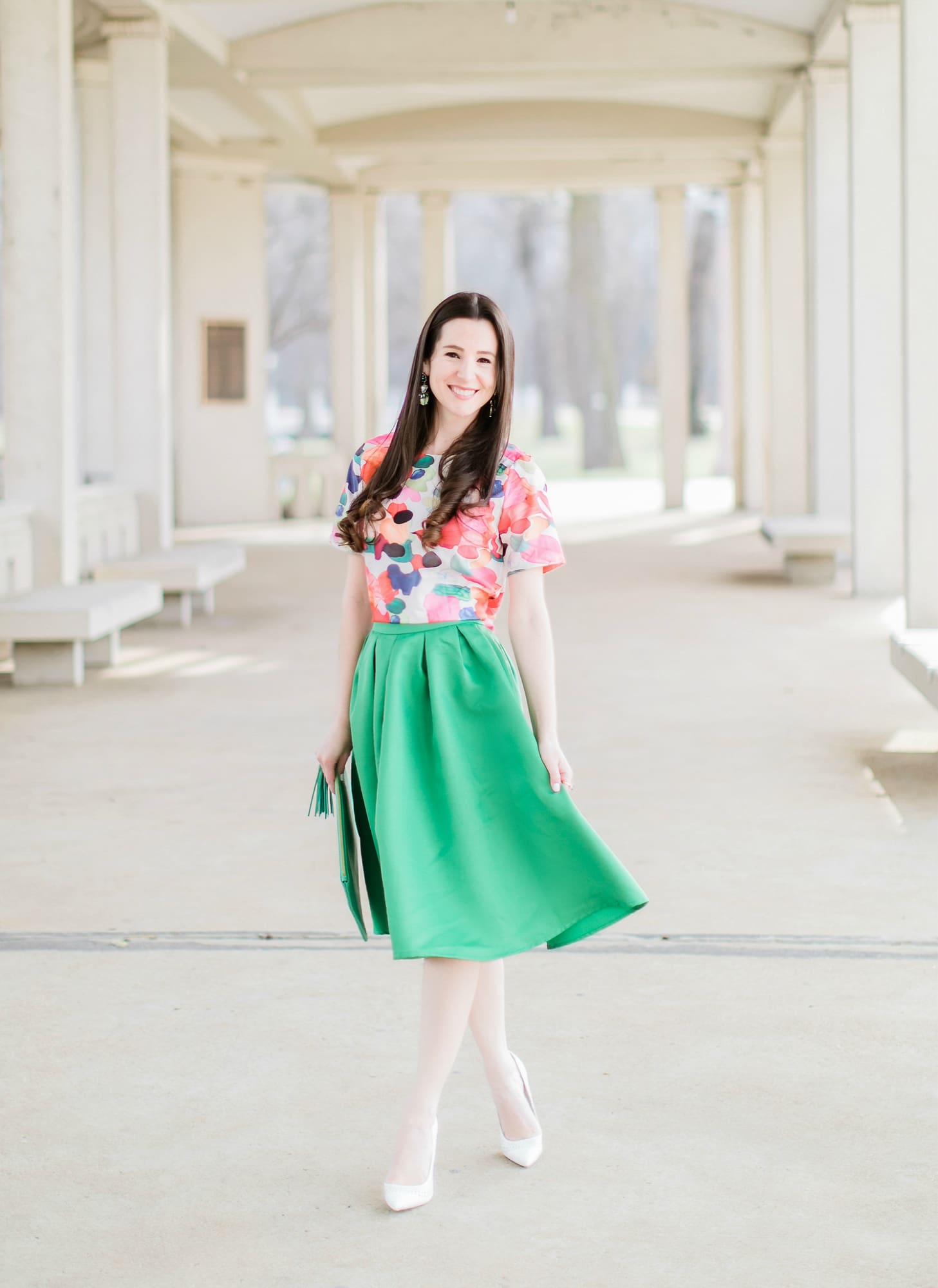 Why We Should Embrace Modesty in Modern Fashion by southern fashion blogger Stephanie Ziajka from Diary of a Debutante, kelly green a-line skirt styled with a colorful calico print crop top, white Sam Edelman pointed toe pumps, and a green monogrammed GiGi New York Uber clutch, modest outfit for women, modest dresses and skirts for women