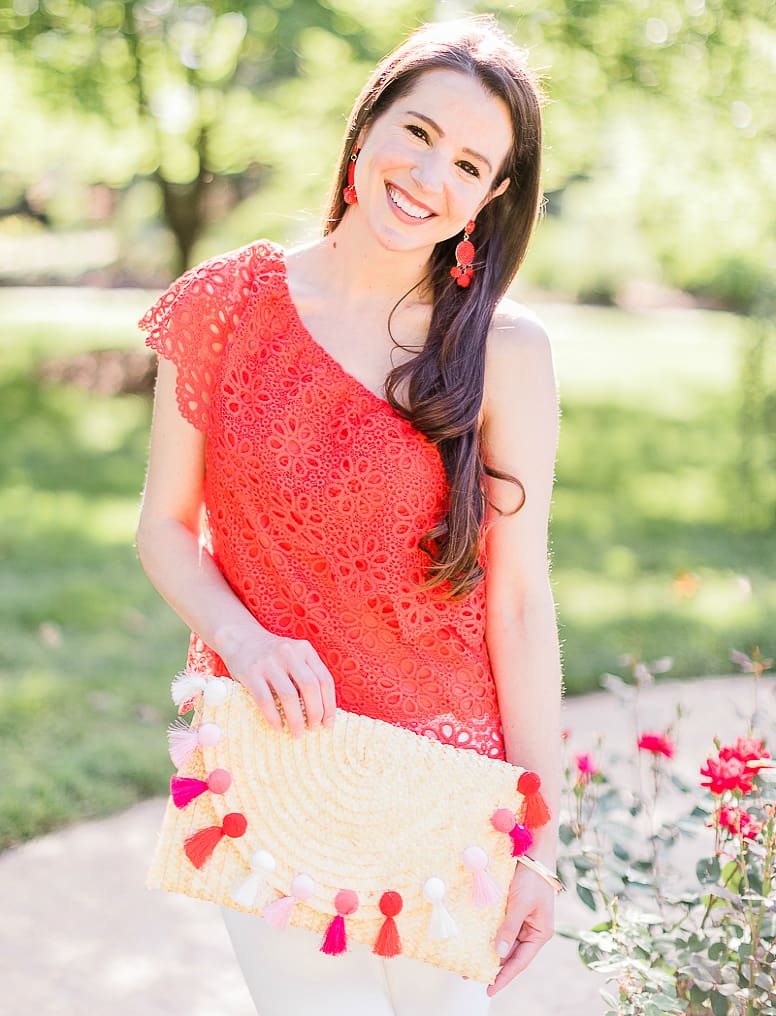 What to wear over Memorial Day Weekend by southern fashion blogger Stephanie Ziajka from Diary of a Debutante, Memorial Day outfit idea, BB Dakota Lolita top styled with white Levi's ankle skinny jeans, Madden nude wedges, Amazon straw tassel clutch, Amazon red beaded earrings, and Kendra Scott Aubrey mixed metals bangle bracelet set