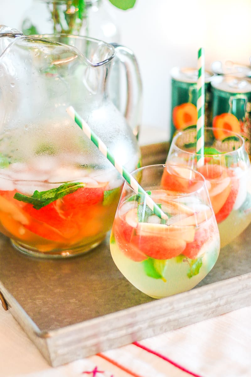 Skinny peach mint cocktail made with Peach Perrier and organic blue agave by southern blogger Stephanie Ziajka from Diary of a Debutante, skinny peach mojito recipe, summer cocktail with flavored carbonated water, Perrier flavors