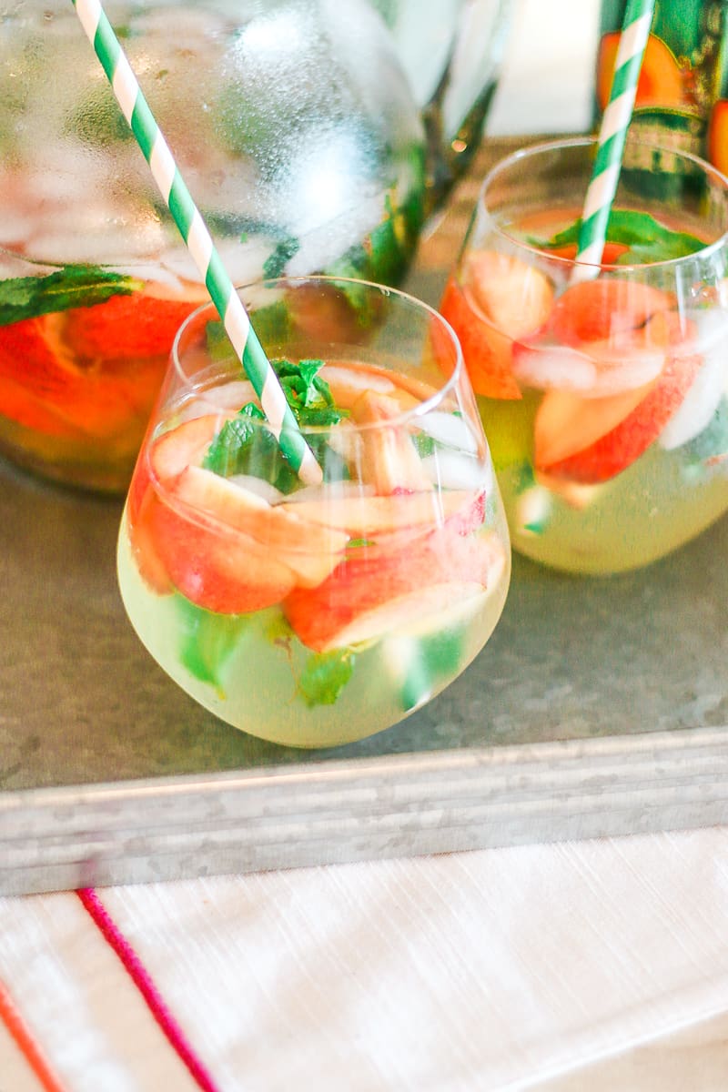 Skinny peach mint cocktail made with Peach Perrier and organic blue agave by southern blogger Stephanie Ziajka from Diary of a Debutante, skinny peach mojito recipe, summer cocktail with flavored carbonated water, Perrier flavors Skinny peach mint cocktail made with Peach Perrier and organic blue agave by southern blogger Stephanie Ziajka from Diary of a Debutante, skinny peach mojito recipe, summer cocktail with flavored carbonated water, Perrier flavors