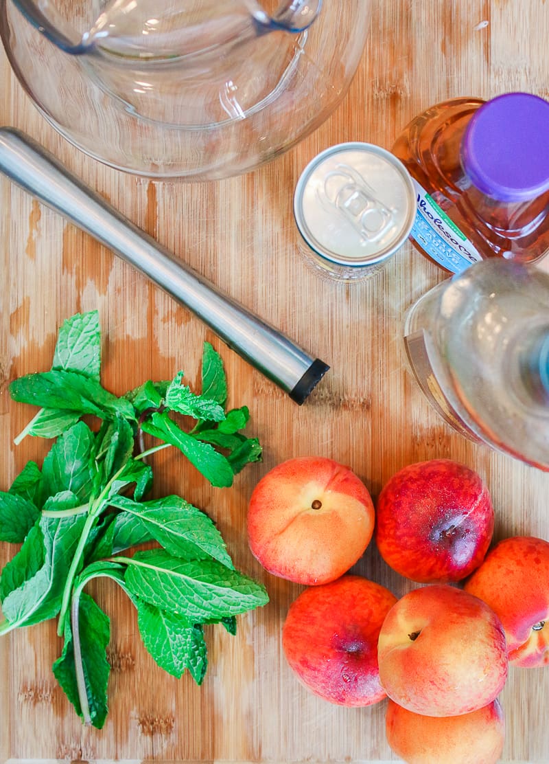 Skinny peach mint cocktail made with Peach Perrier and organic blue agave by southern blogger Stephanie Ziajka from Diary of a Debutante, skinny peach mojito recipe, summer cocktail with flavored carbonated water, Perrier flavors