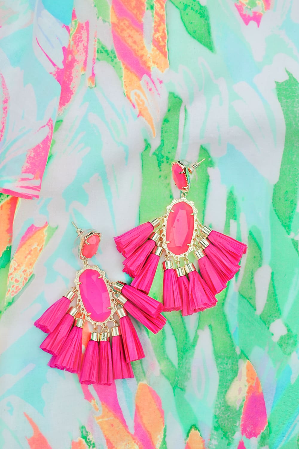 Summer Snacking: Where to Find the Best Mochi (And All the Best Mochi Flavors) by blogger Stephanie Ziajka from Diary of a Debutante, Lilly Pulitzer cold shoulder top with Cult Gaia dupe bag, Levi's 501 jean shorts, and Kendra Scott tassel earrings