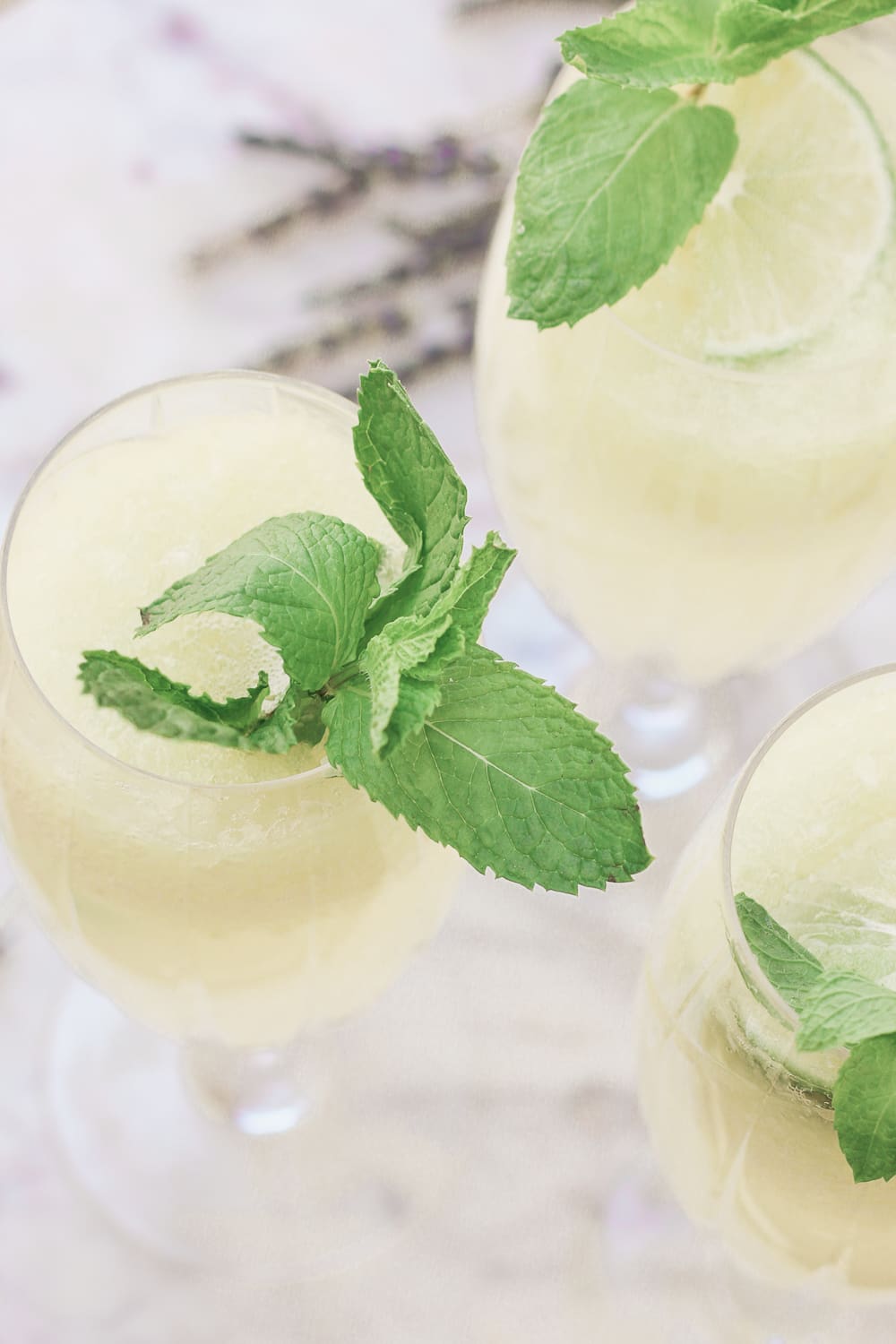 Cucumber Mocktail Recipe for Summer: Cucumber-Lime-Lavender Spritzer by southern lifestyle blogger Stephanie Ziajka from Diary of a Debutante, cucumber mocktail recipes, edible lavender cocktail recipe, Cooking Light mocktail recipes, summer mocktail ideas
