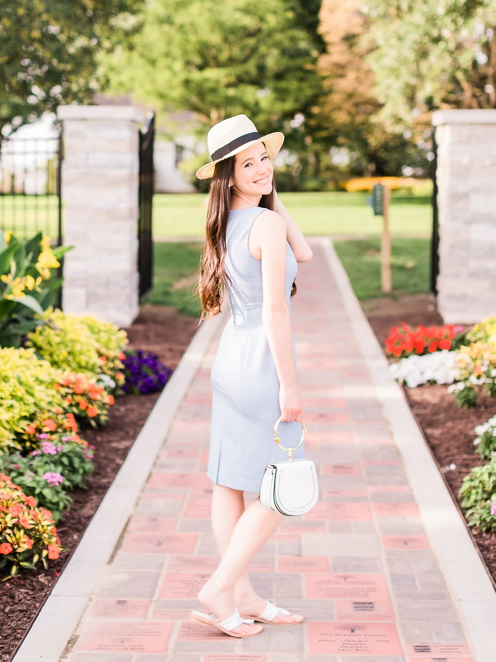 How to wear a sheath dress on vacation, Banana Republic paneled sheath dress, Banana Republic Packable Raffia Hat, Go with the Flow: How to Wear Your Work Clothes on Vacation by affordable style blogger Stephanie Ziajka from Diary of a Debutante