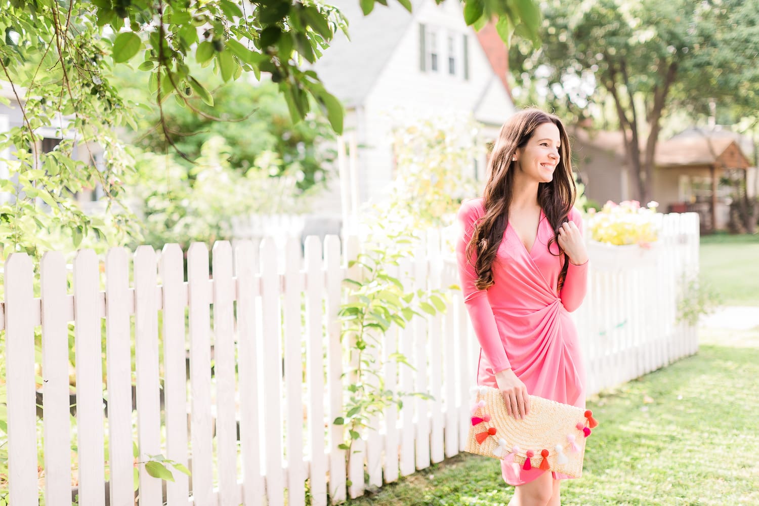 What to wear to a fall baby shower by affordable style blogger Stephanie Ziajka from Diary of a Debutante, what to wear to a baby shower in October, what to wear for gender reveal, how to dress for breast cancer awareness, pink Lark & Ro wrap dress with pink straw tassel clutch and M. Gemi The Cammeo pumps